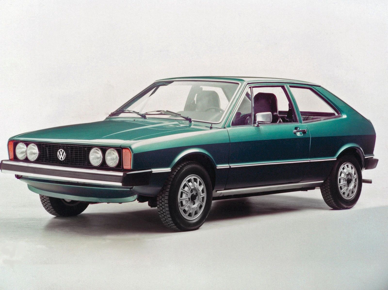 CC Tech: How The Nimble 1975 Volkswagen Golf, Rabbit, And Scirocco Raised The Standards Of FWD Chassis Design 13 Press photo of a blue-green 1974 Volkswagen Scirocco coupe in a studio
