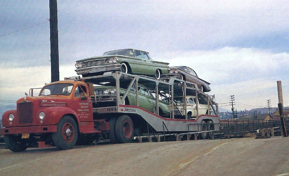 Text by Patrick Bell. We have some more in transit images today, with interesting cars and a closer look at some of the transport equipment and methods.  Nearly all American [&hellip;]