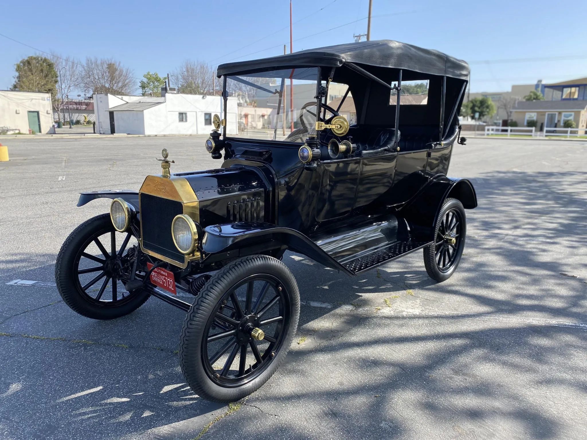 1929 Synchro-Mesh Transmission: How An Engineer From Oregon Took The Clash Out of Shifting Gears 6 1915 Ford Model T touring car with its top up, parked in a shady area of a parking lot
