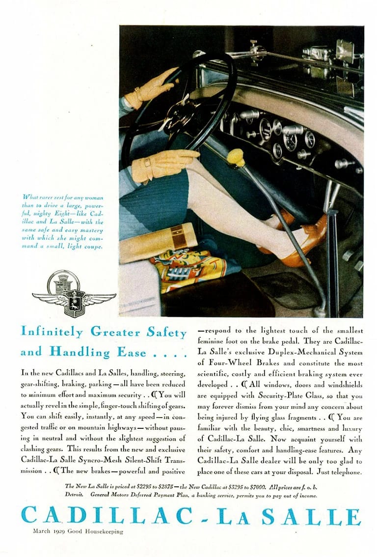 1929 Synchro-Mesh Transmission: How An Engineer From Oregon Took The Clash Out of Shifting Gears 21 Ad showing a color photo of a woman in a blue skirt and tan gloves driving a Cadillac, with the headline "Infinitely Greater Safety and Handling Ease...."
