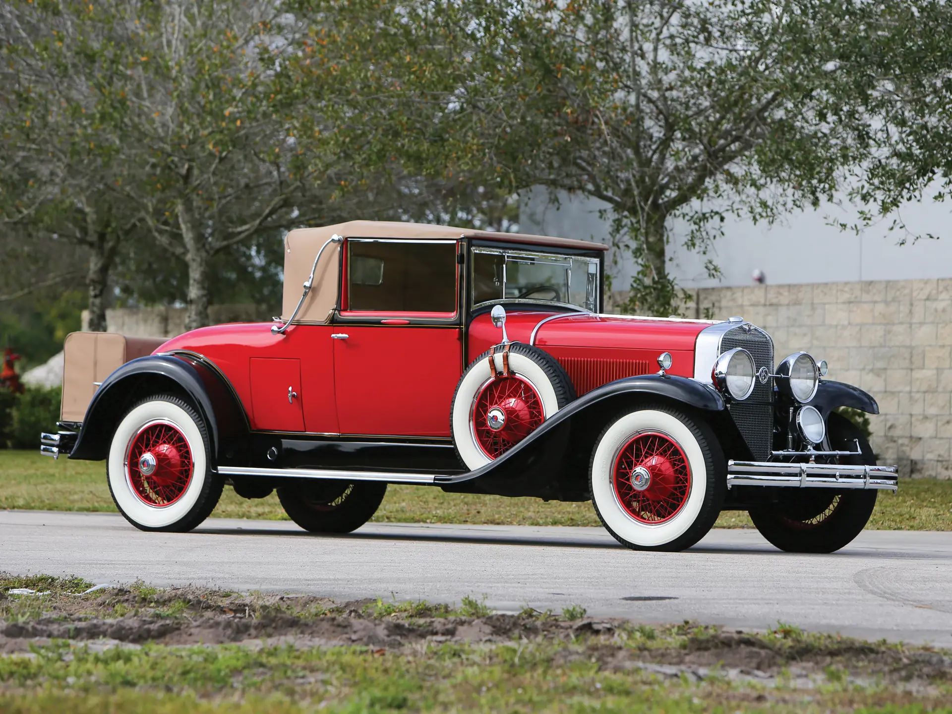 1929 Synchro-Mesh Transmission: How An Engineer From Oregon Took The Clash Out of Shifting Gears 14 Right front 3q view of a red 1929 LaSalle convertible coupe with whitewall tires, red wire wheels, and a tan top