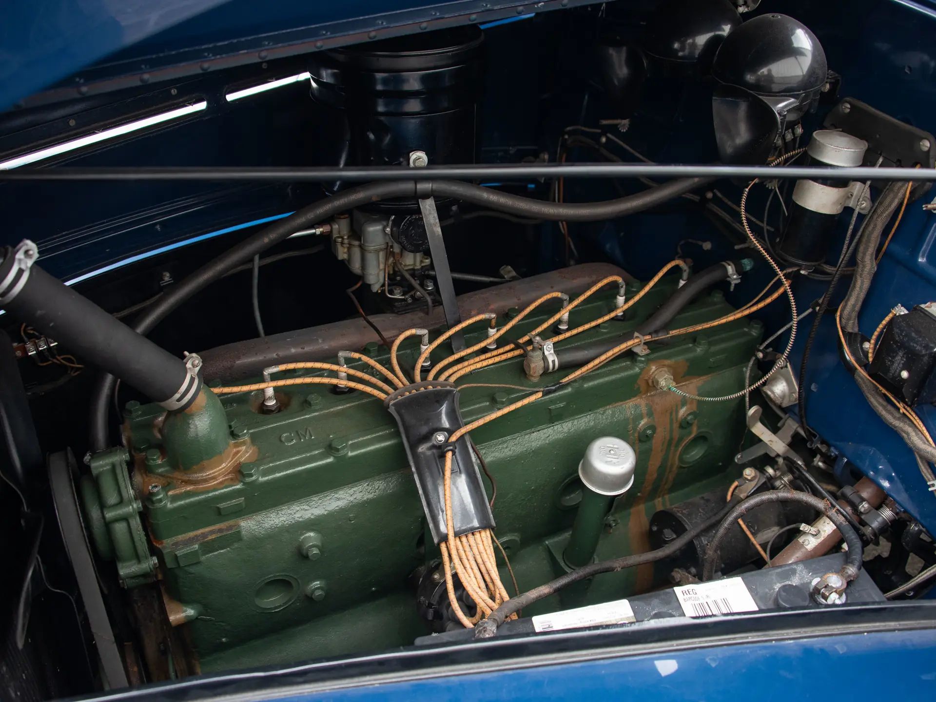 Oldsmobile straight 8 engine in a blue 1938 Oldsmobile L-38