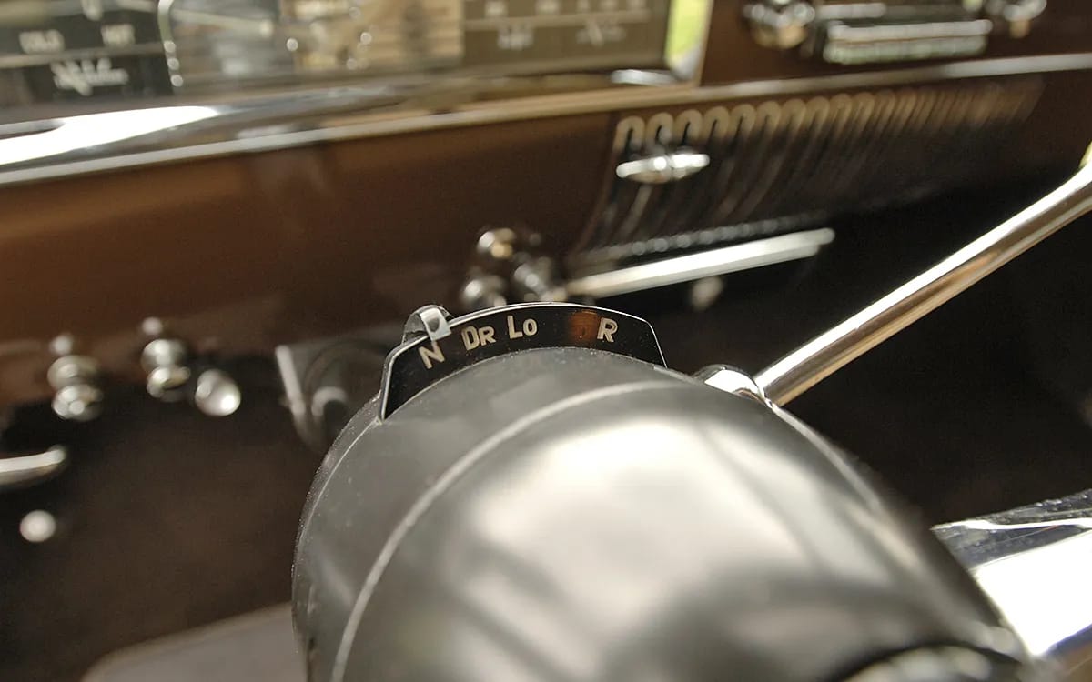 Closeup of the Hydra-Matic shift quadrant on the steering column of a 1949 Cadillac Series 62