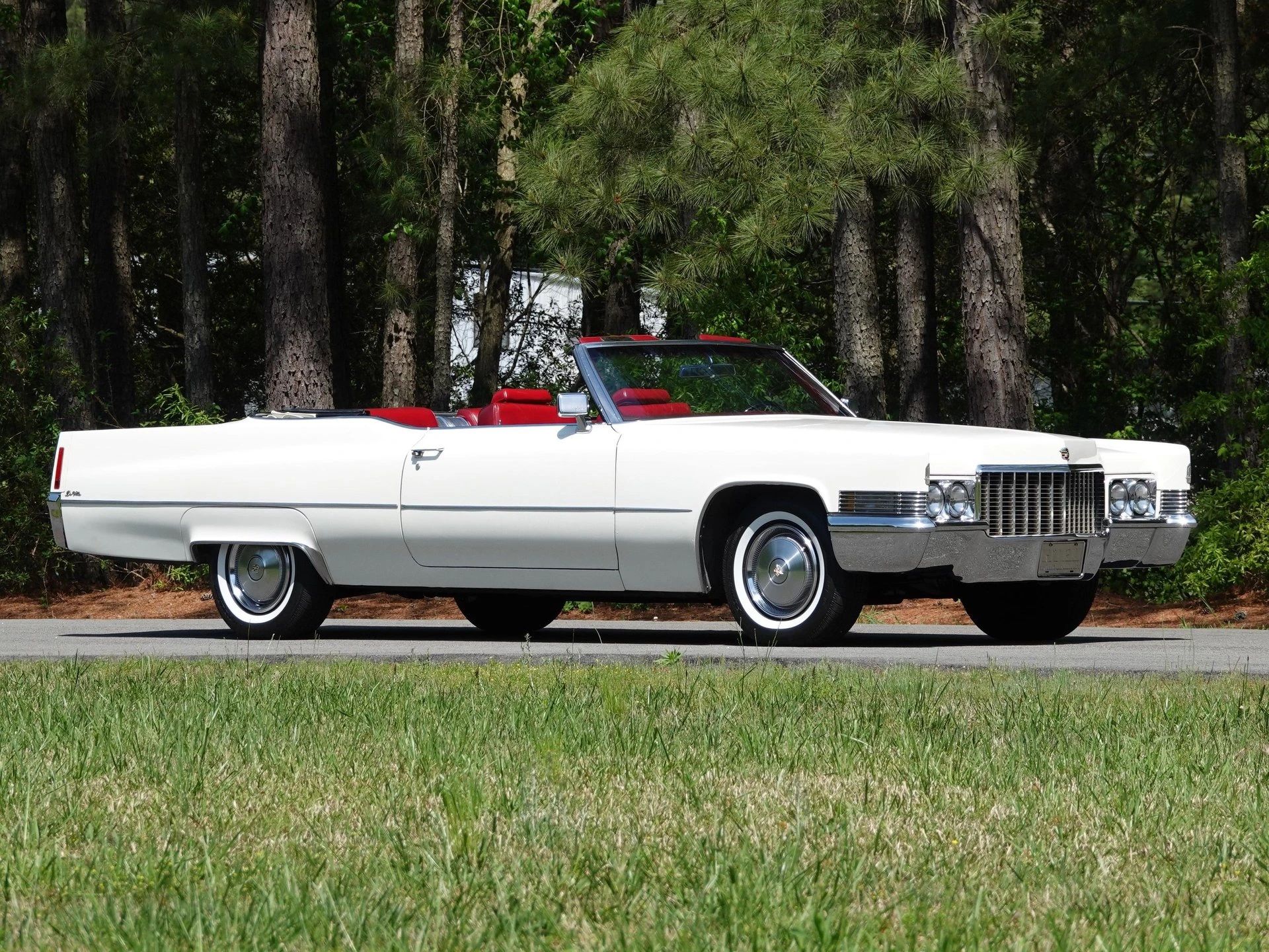 Decade De Ville: Cadillac's Bestselling '70s De Villes 5 Right front 3q view of a white 1970 Cadillac De Ville convertible with a red leather interior