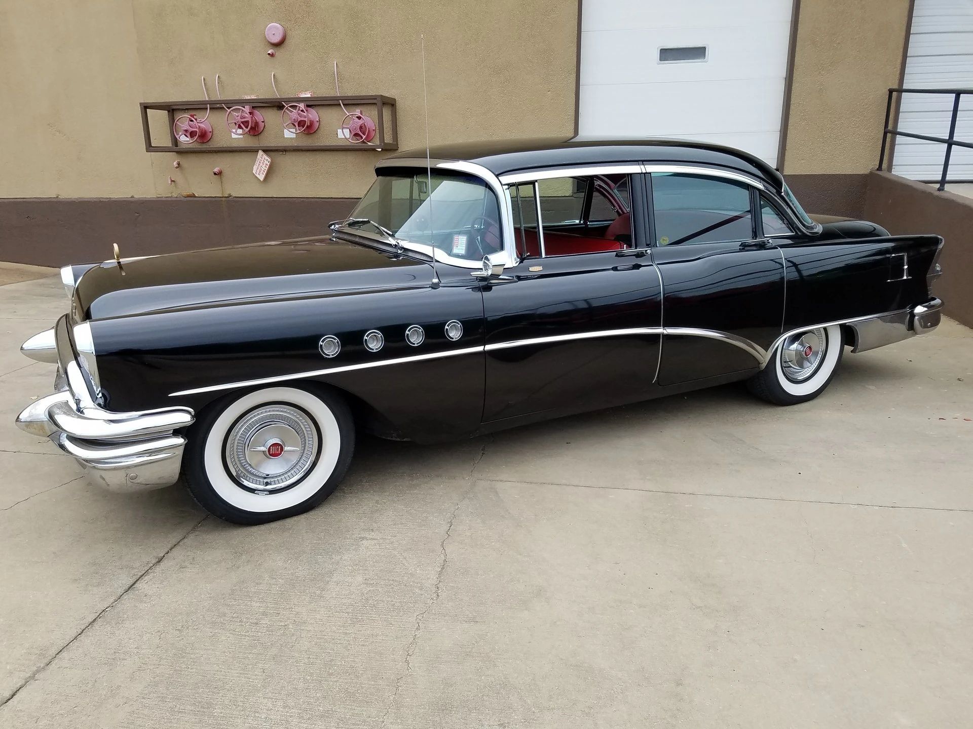 Full-Size Buicks Of The 1960s: How Buick Reinvented Its Lineup Between 1959 And 1970 2 Left side view of a black 1955 Buick Roadmaster four-door sedan