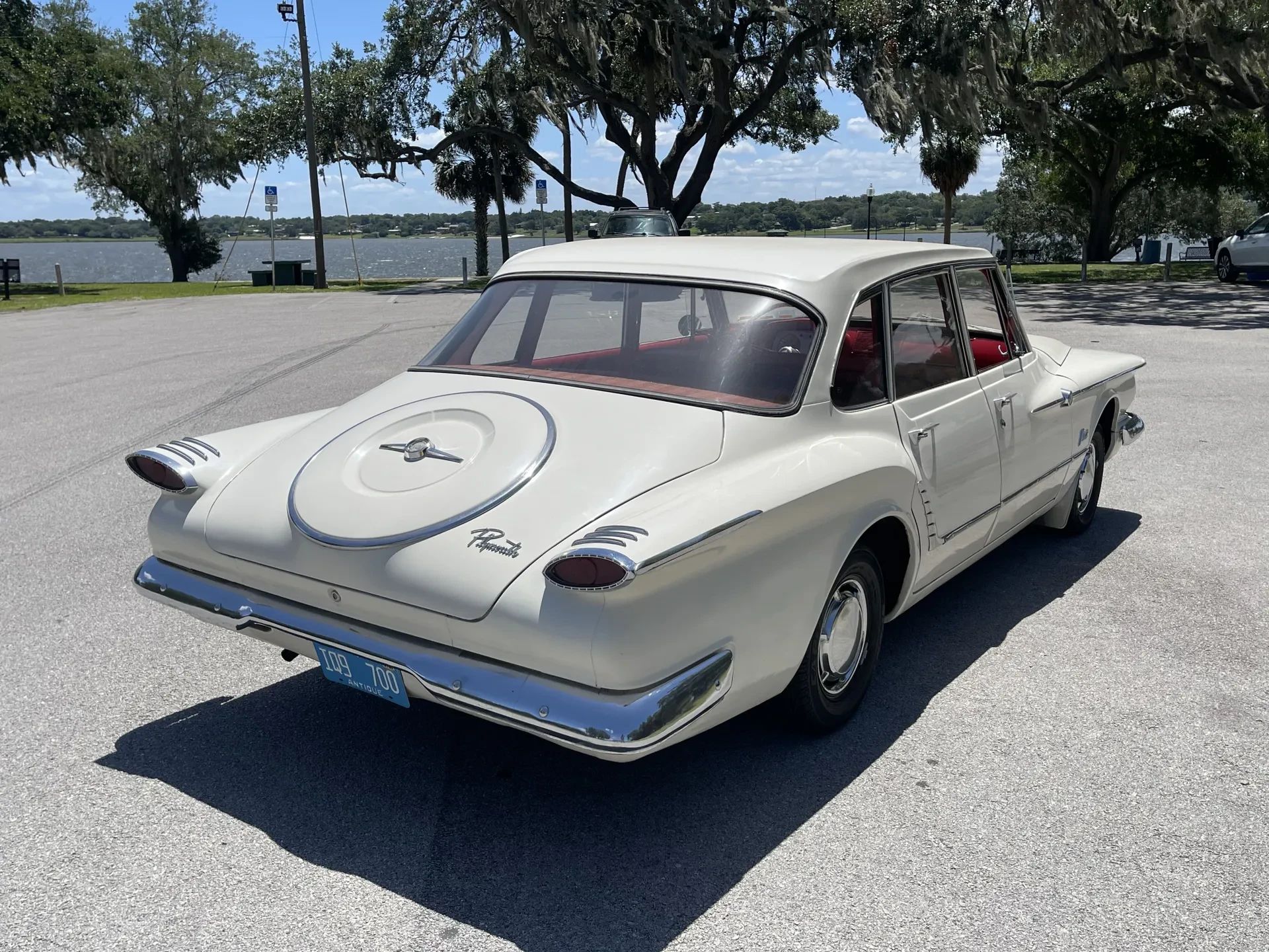 1960–1962 Plymouth Valiant Versus 1986–1991 Ford Taurus – Closer Than They Appear 7 Right rear 3q view of a white 1961 Plymouth Valiant V200 sedan