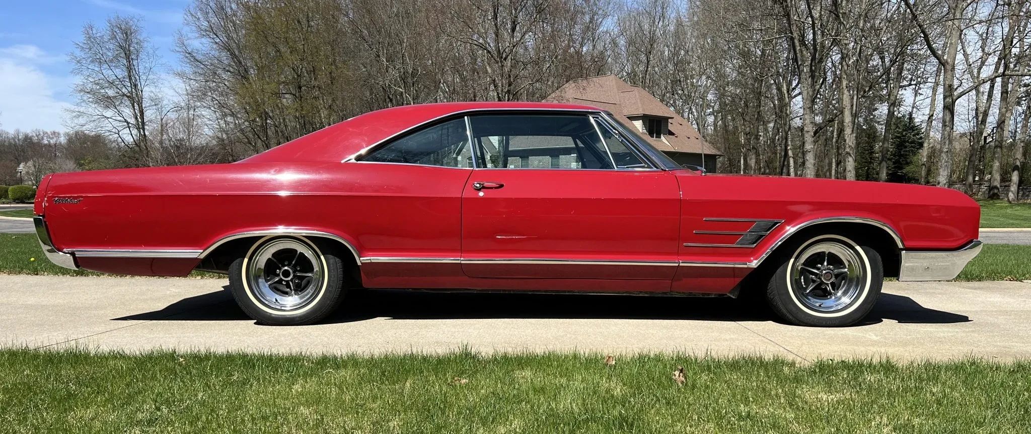 Full-Size Buicks Of The 1960s: How Buick Reinvented Its Lineup Between 1959 And 1970 19 Right side view of a red 1965 Buick Wildcat Custom two-door hardtop with chromed steel wheels