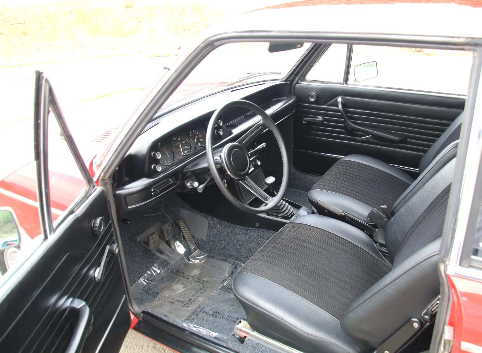 1972 BMW 2000 Touring – Rare BMW 2002 Hatchback Version, Never Sold In The U.S. 10 Dashboard and front seats of a red 1972 BMW 1800 Touring