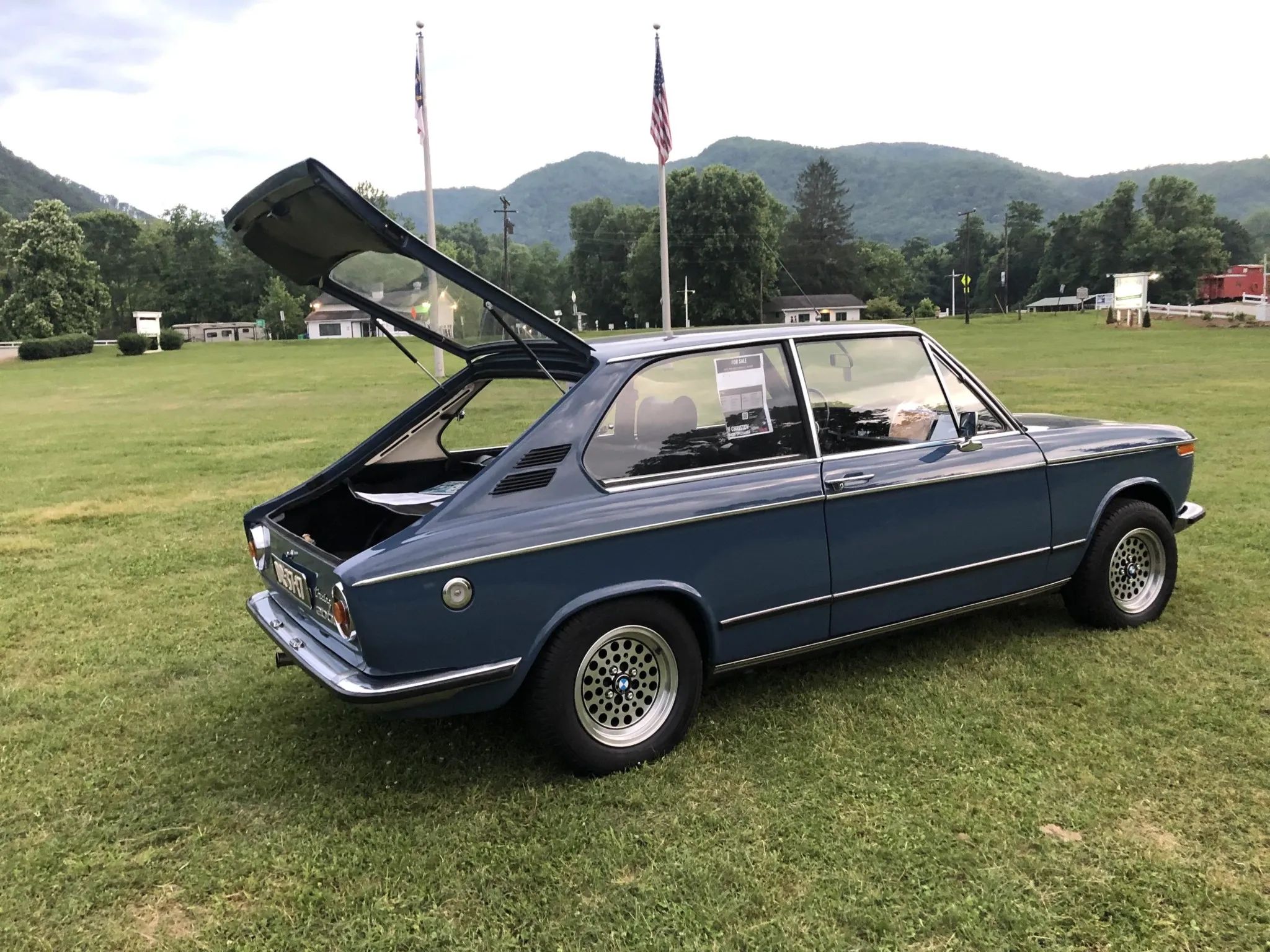 1972 BMW 2000 Touring – Rare BMW 2002 Hatchback Version, Never Sold In The U.S. 12 Right rear 3q view of a blue 1972 BMW 2000 Touring parked on grass with the rear hatch open