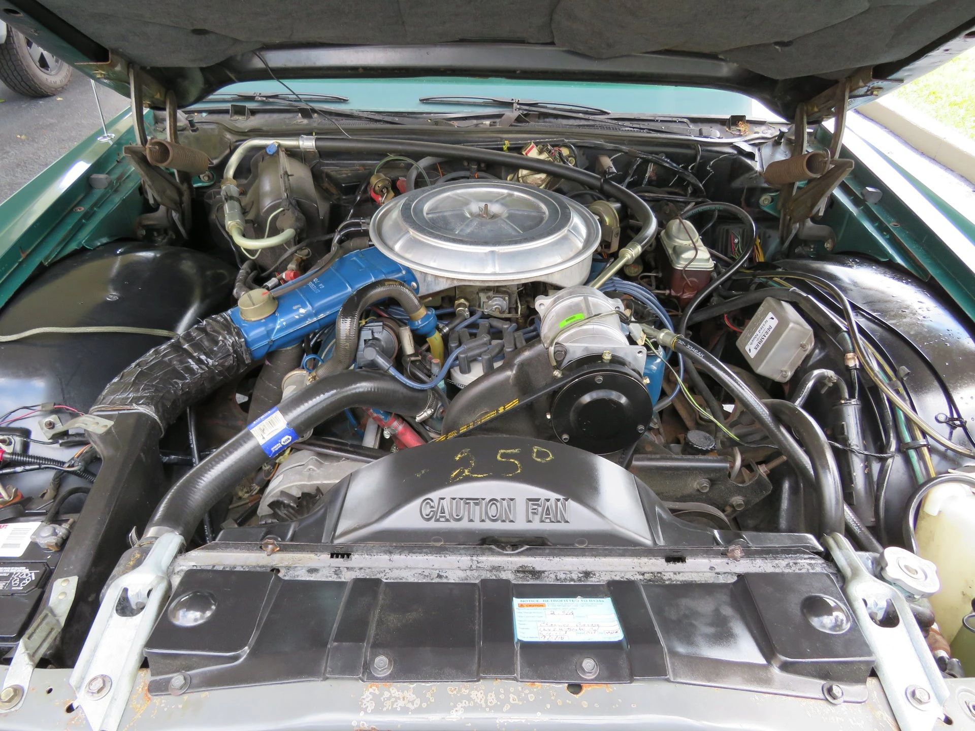 1977 Lincoln Continental Mark V: Bigger Than Ever, This Defiant Dinosaur Was Rolling In Green 13 460 engine under the hood of a green 1977 Lincoln Continental Mark V