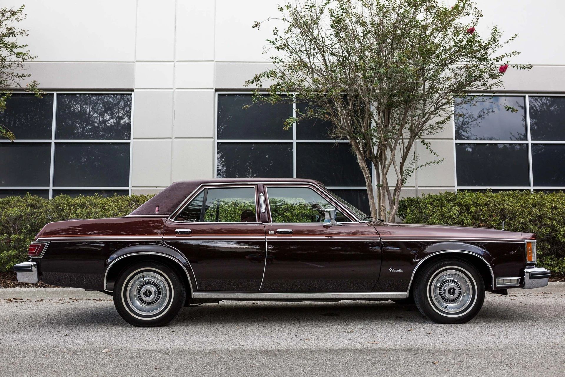 1977–1980 Lincoln Versailles: Slow-Selling, Cynical, But Very Profitable 31 Right side view of a burgundy 1977 Lincoln Versailles