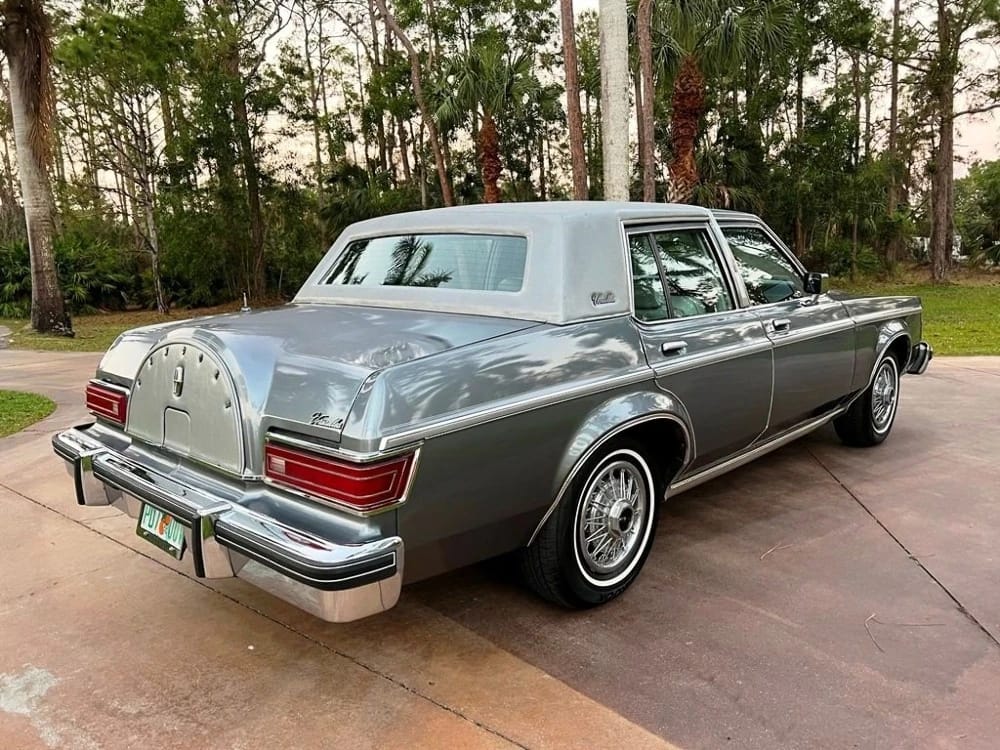 1977–1980 Lincoln Versailles: Slow-Selling, Cynical, But Very Profitable 25 Right rear 3q view of a gray 1979 Lincoln Versailles