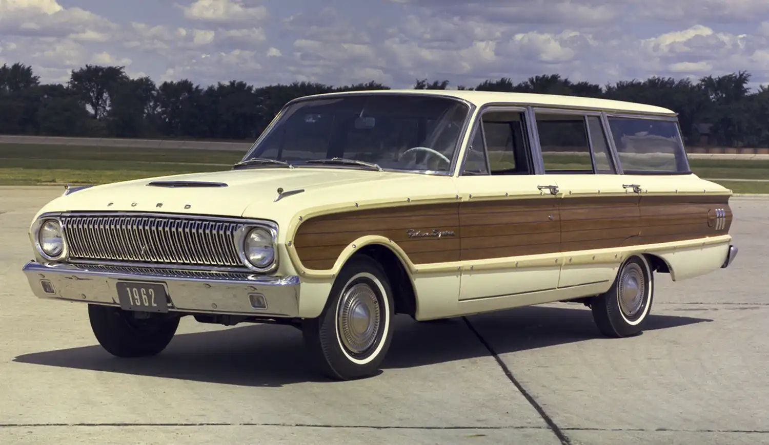 1962 Ford Falcon Tudor (2-Door) Wagon - Practical Transport Early '60s Style, Still Doing The Same Job Today 5 Publicity shot of a white 1962 Ford Falcon Squire sation wagon parked on a concrete runway