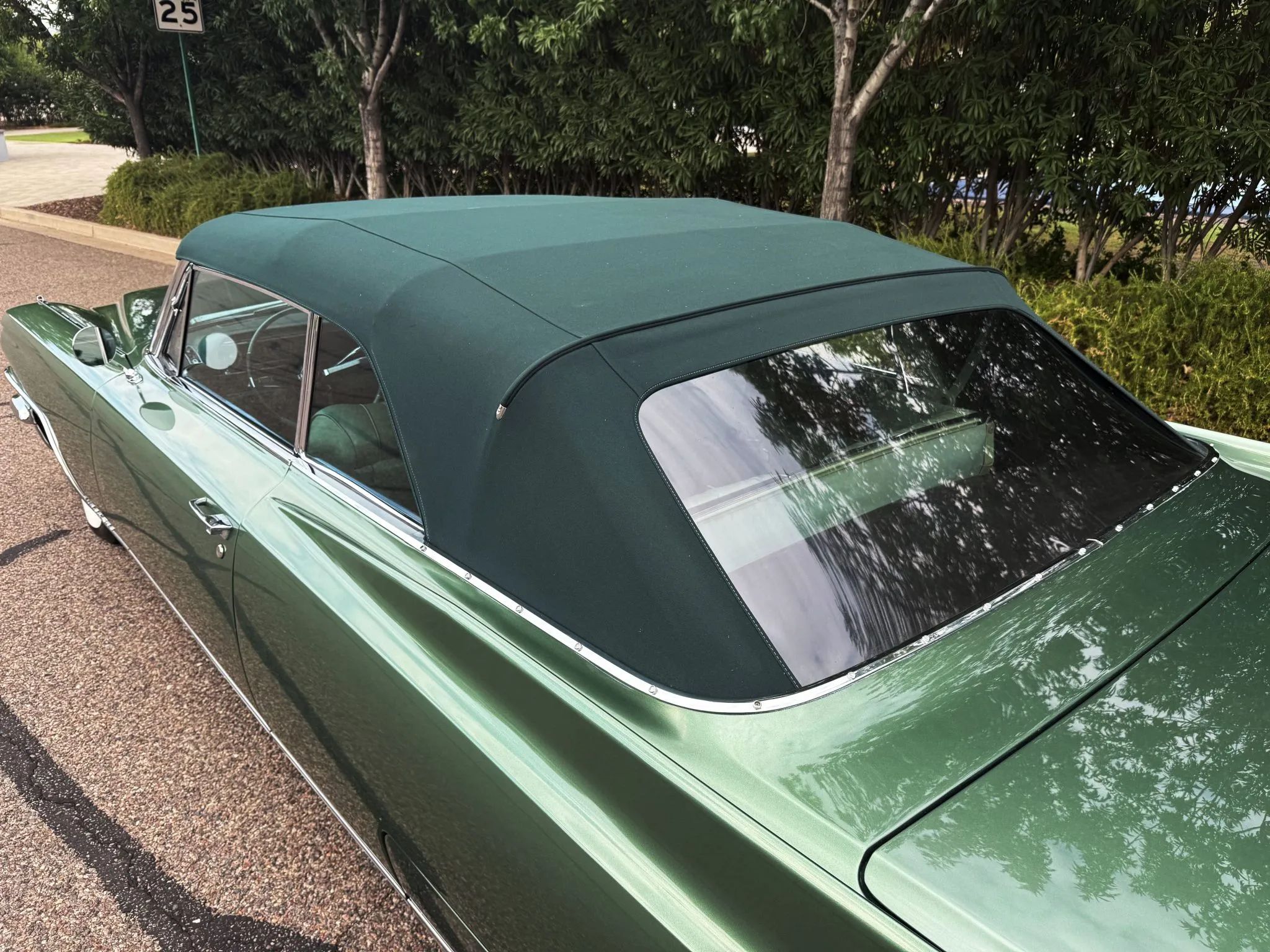 Color-Coordinated Cadillacs: Colorful Eldorados, De Villes, And Fleetwood Broughams 19 Green convertible top on a green 1963 Cadillac Eldorado