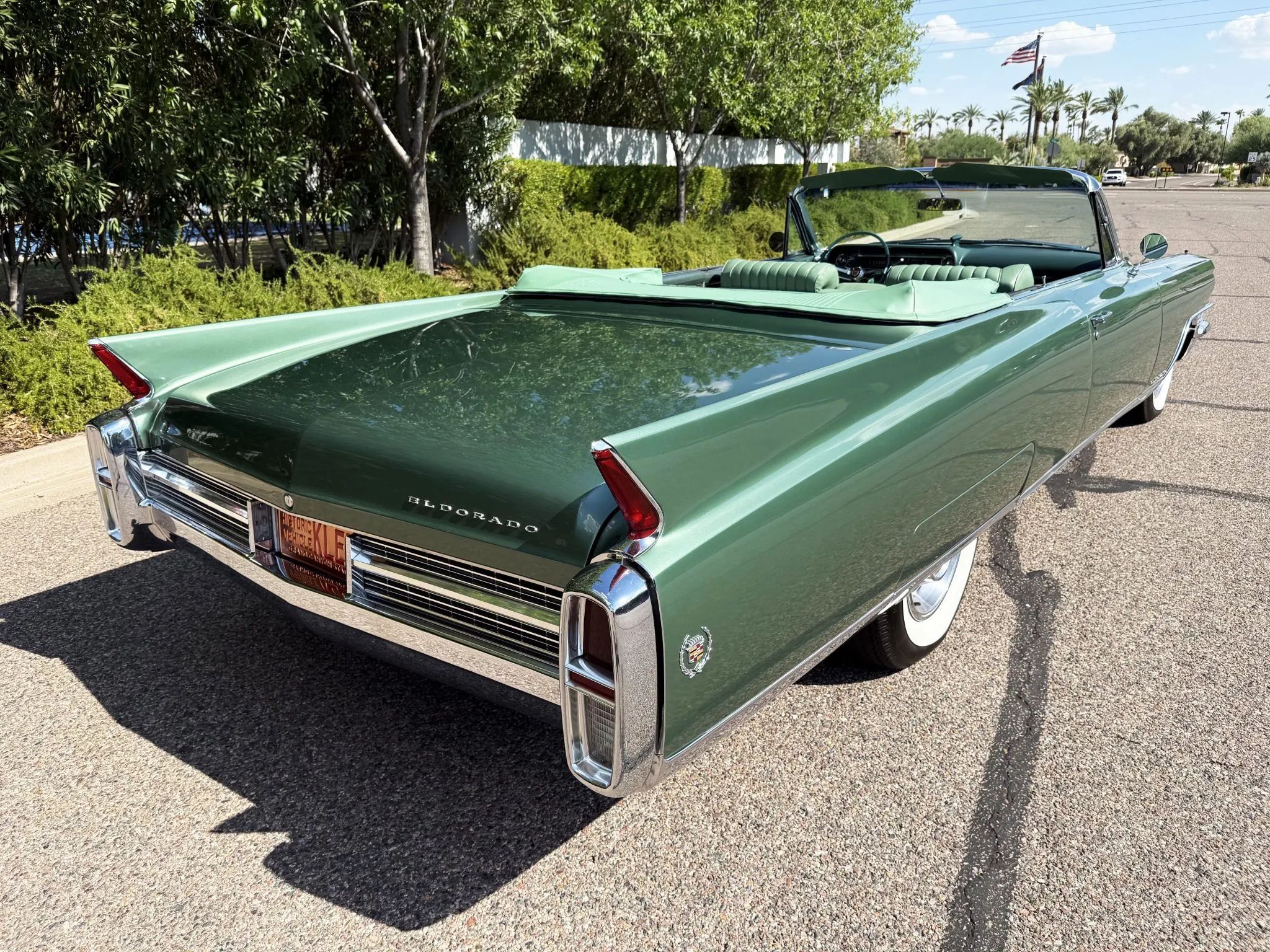 Color-Coordinated Cadillacs: Colorful Eldorados, De Villes, And Fleetwood Broughams 17 Right rear 3q view of a green Cadillac Eldorado with the top down