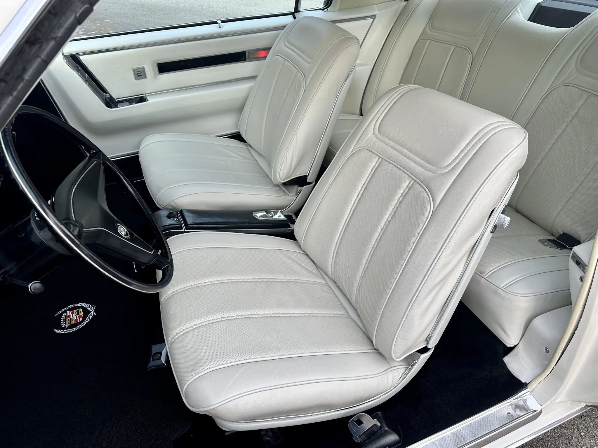 Color-Coordinated Cadillacs: Colorful Eldorados, De Villes, And Fleetwood Broughams 37 White leather bucket seats in a 1967 Cadillac Eldorado