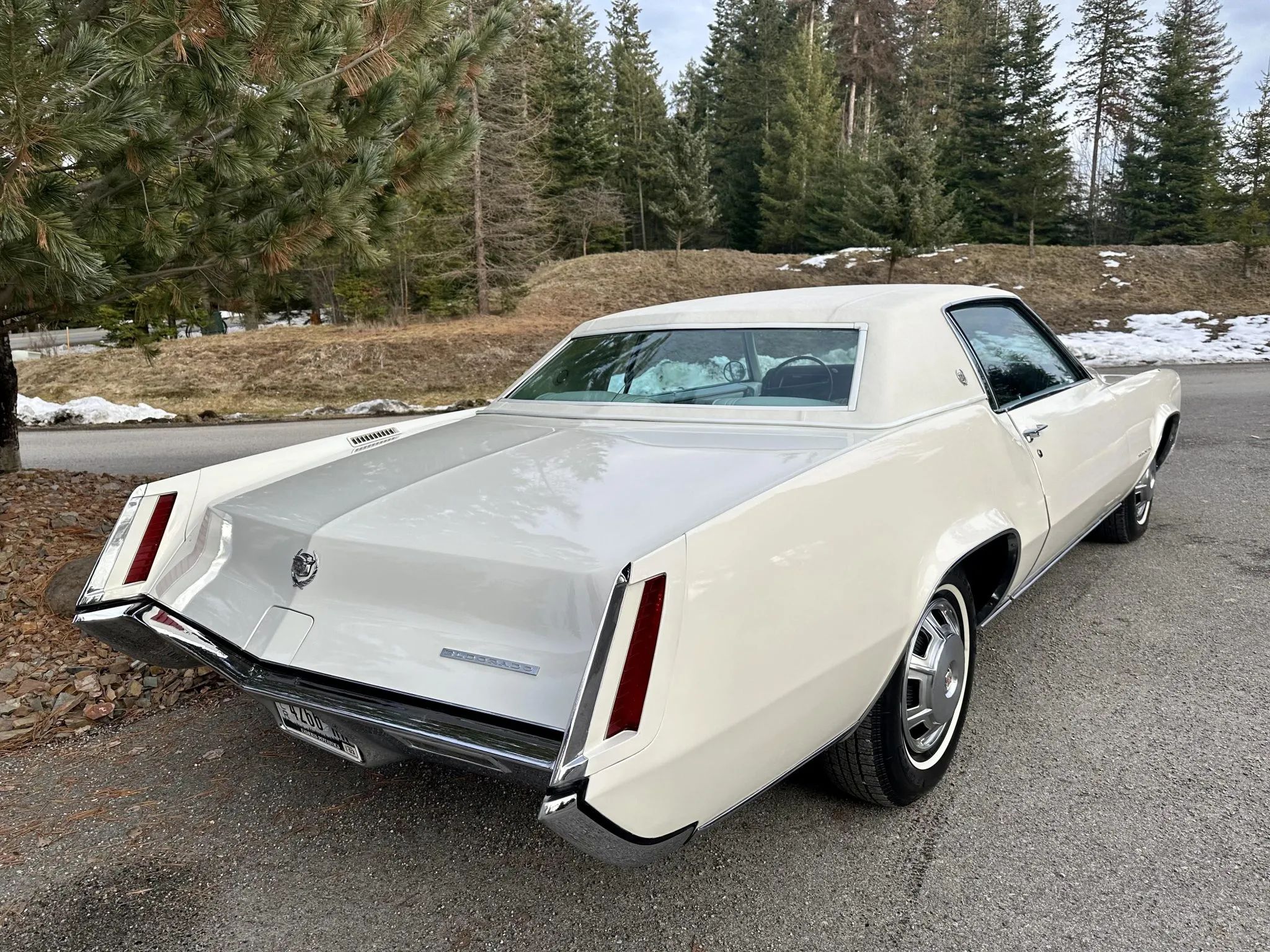 Color-Coordinated Cadillacs: Colorful Eldorados, De Villes, And Fleetwood Broughams 35 Right rear 3q view of a white 1967 Cadillac Eldorado with a matching vinyl roof