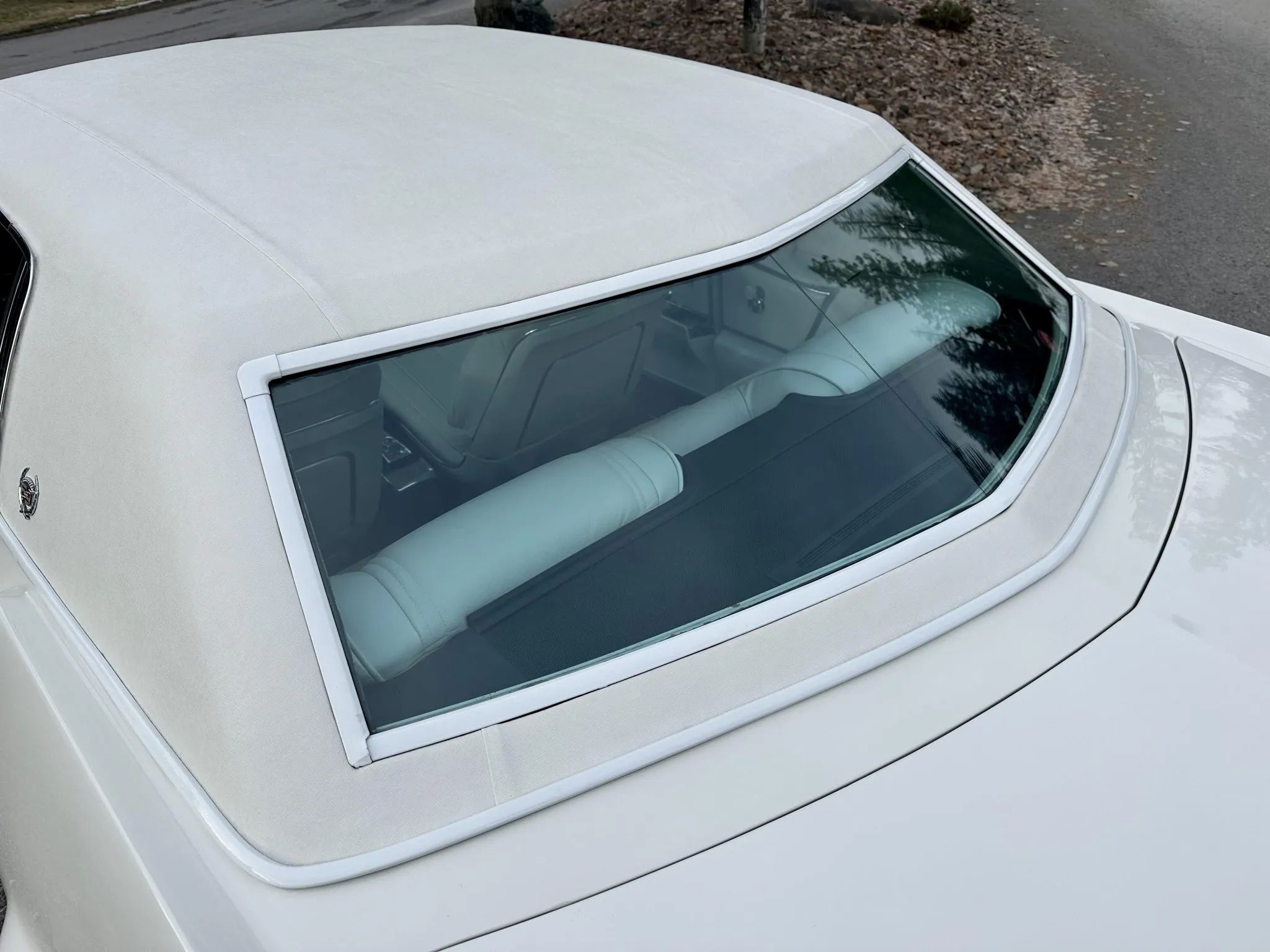 Color-Coordinated Cadillacs: Colorful Eldorados, De Villes, And Fleetwood Broughams 36 White padded roof on a white 1967 Cadillac Eldorado