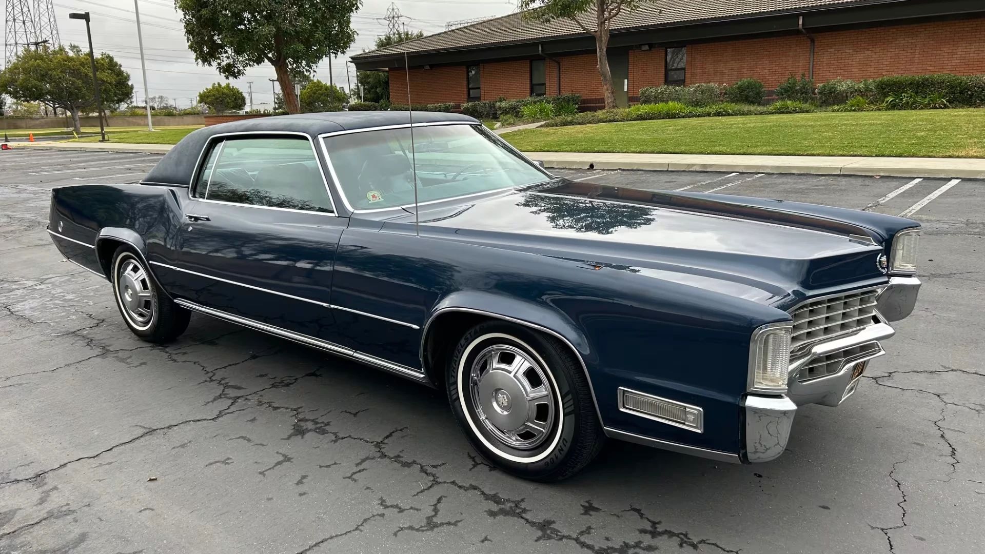 Color-Coordinated Cadillacs: Colorful Eldorados, De Villes, And Fleetwood Broughams 24 Front 3q view of a dark blue 1968 Cadillac Eldorado with a matching vinyl top
