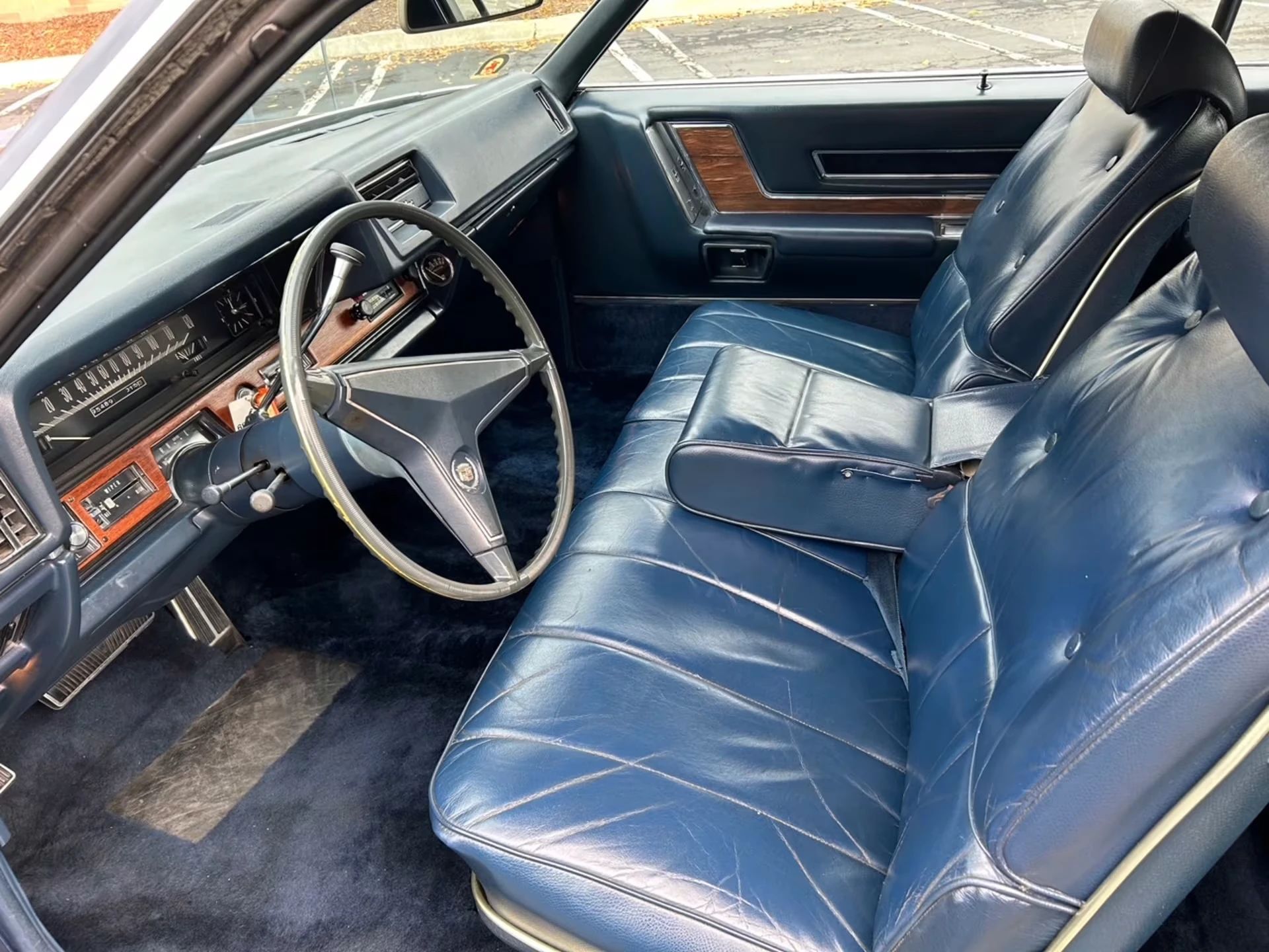 Color-Coordinated Cadillacs: Colorful Eldorados, De Villes, And Fleetwood Broughams 26 Front seat of a 1968 Cadillac Eldorado with a dark blue interior and leather seats
