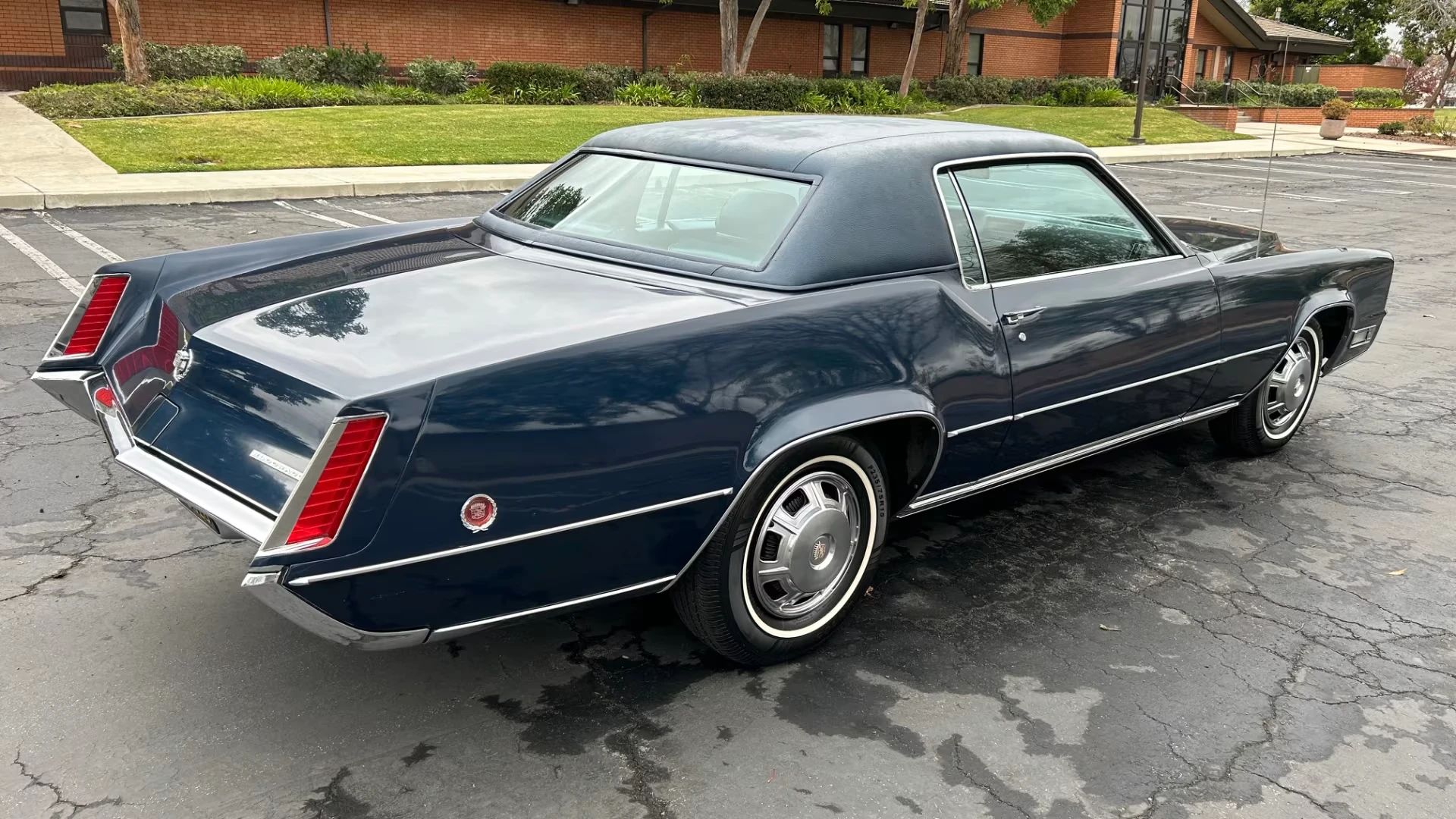 Color-Coordinated Cadillacs: Colorful Eldorados, De Villes, And Fleetwood Broughams 25 Right rear 3q view of a dark blue 1968 Cadillac Eldorado with a matching vinyl top