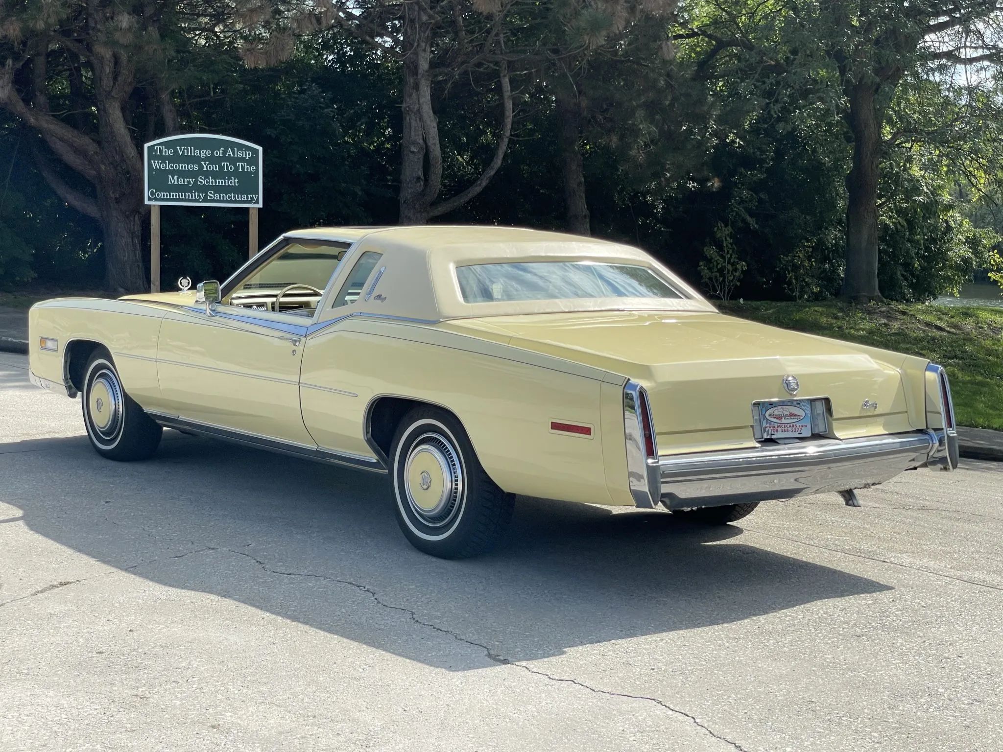 Color-Coordinated Cadillacs: Colorful Eldorados, De Villes, And Fleetwood Broughams 14 Left rear 3q view of a yellow 1978 Cadillac Eldorado hardtop with a matching vinyl top and yellow wheel discs