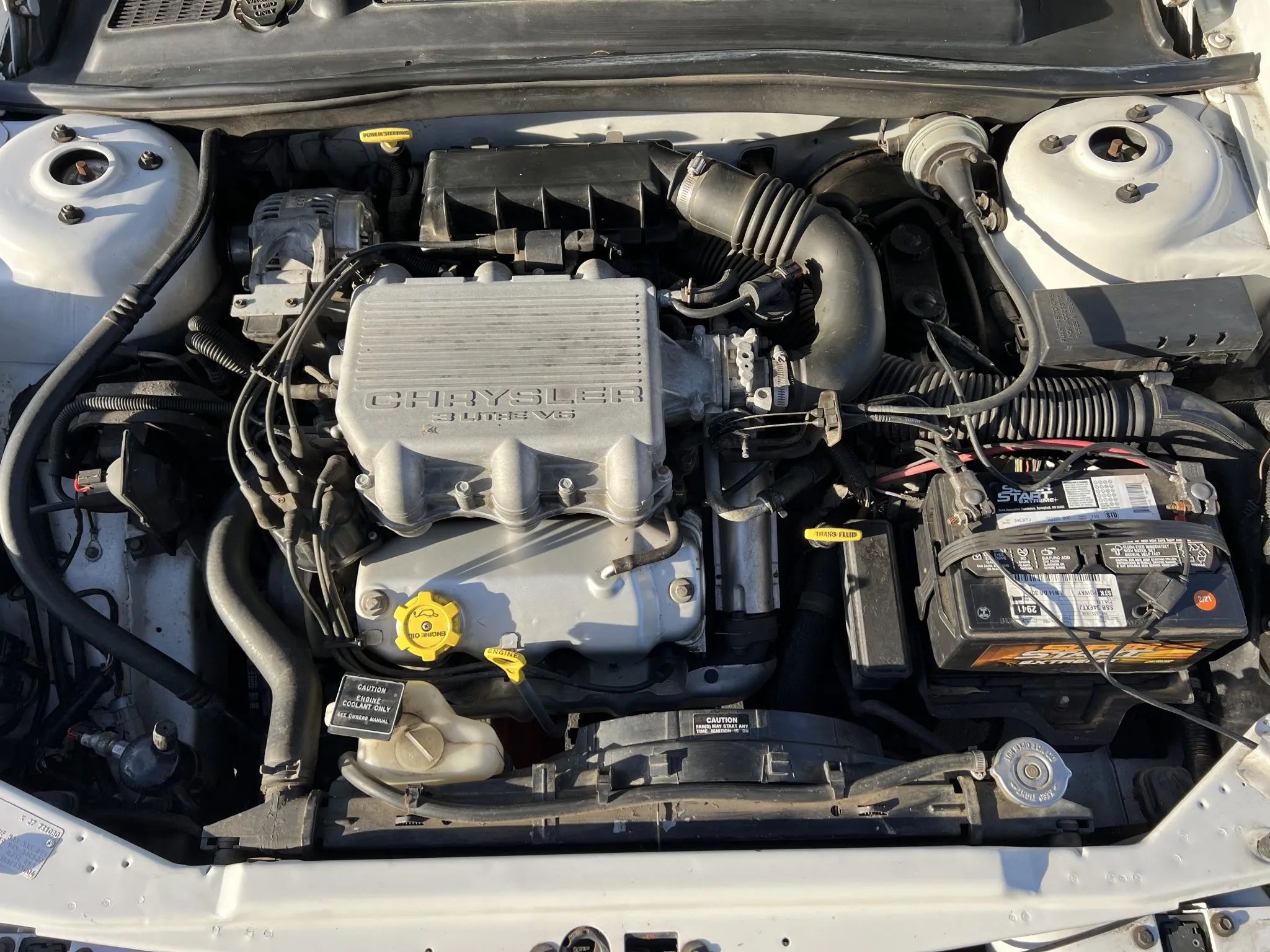 1994–1995 Chrysler LeBaron GTC Convertible – A Rental Car Favorite Nears Its Final Curtain 9 Chrysler-labeled Mitsubishi V-6 engine under the hood of a 1995 Chrysler LeBaron