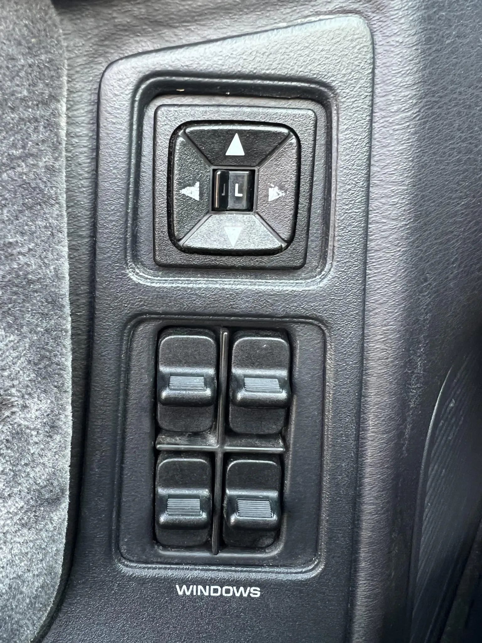 1994–1995 Chrysler LeBaron GTC Convertible – A Rental Car Favorite Nears Its Final Curtain 13 Door controls for power mirrors and windows in a 1995 Chrysler LeBaron