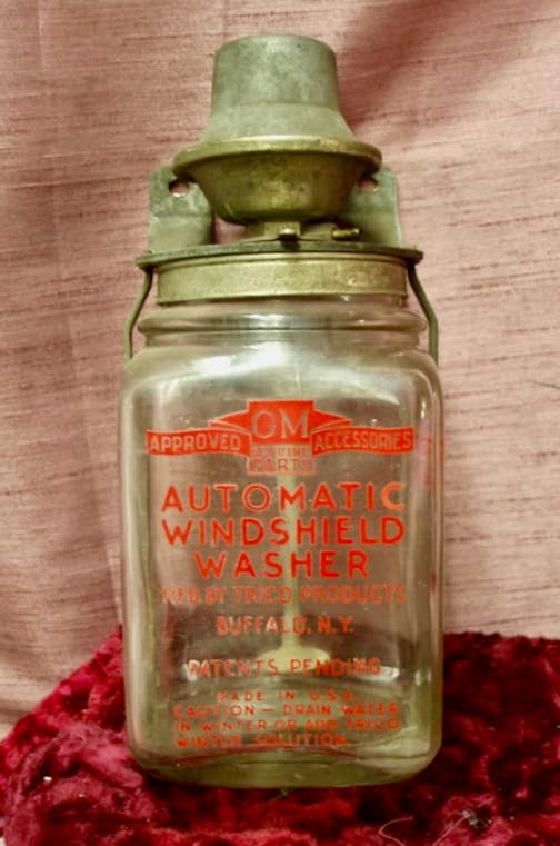 Squirts, Bottles and Bags: A Kleer View on Windshield Washing History 19 1930s Chevy Trico Bottle 1939