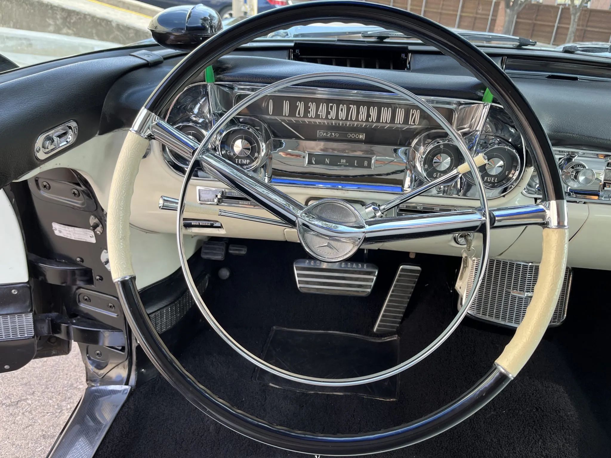 From Chrome To Clear Plastic: Bold Steering Wheels Of The 1950s & 1960s 14 Black and white steering wheel of a 1957 Cadillac Eldorado Brougham with a black and white dashboard