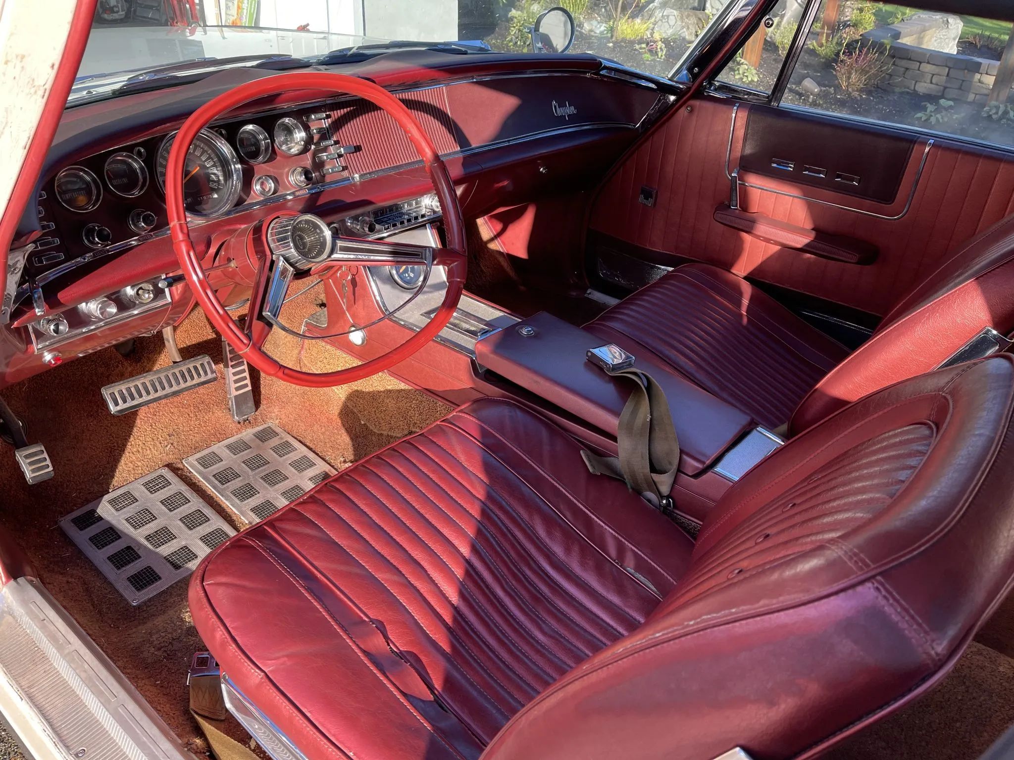 From Chrome To Clear Plastic: Bold Steering Wheels Of The 1950s & 1960s 38 Interior of a 1963 Chrysler 300J hardtop with red dashboard and upholstery