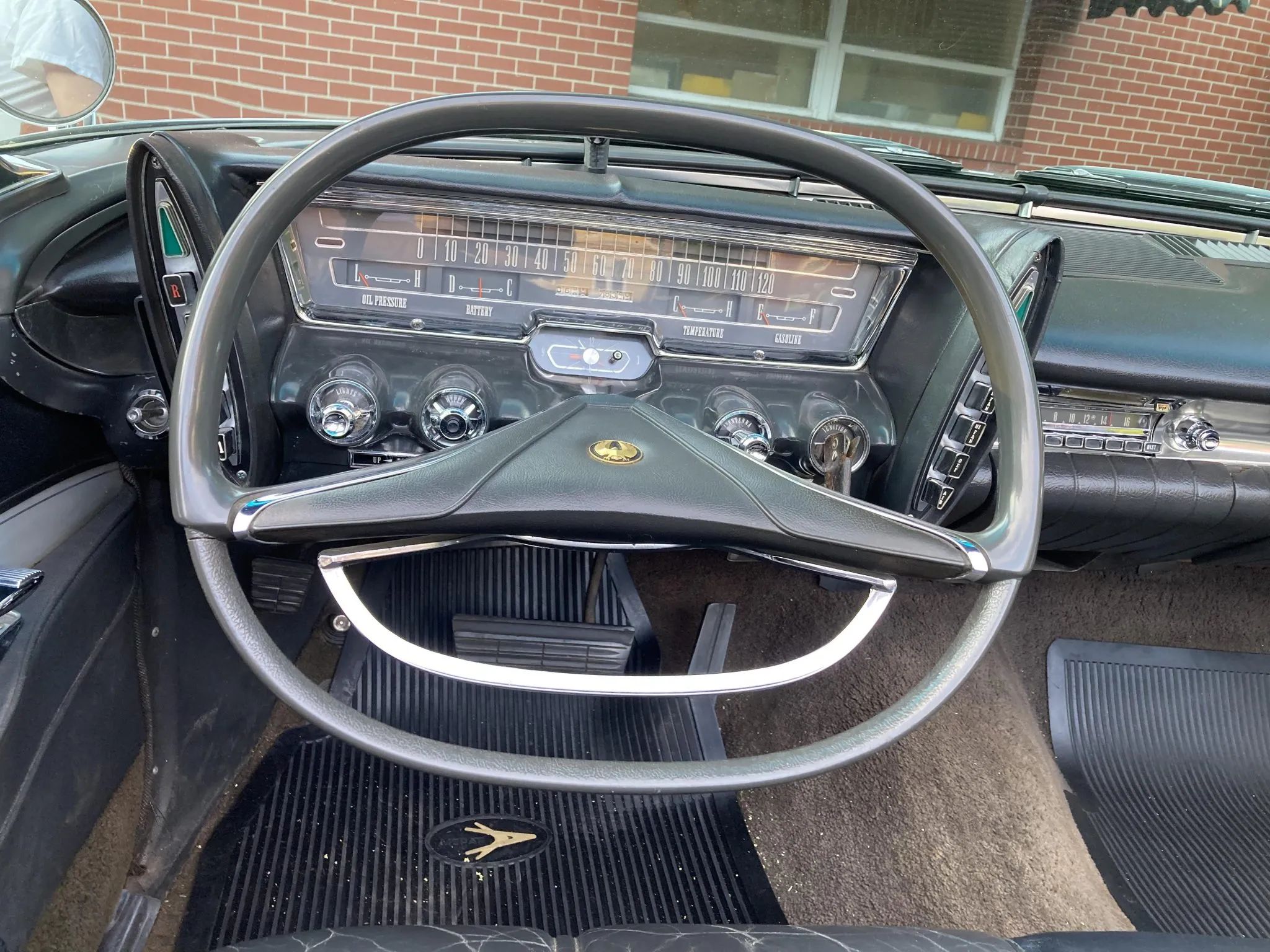 From Chrome To Clear Plastic: Bold Steering Wheels Of The 1950s & 1960s 31 Gray elliptical steering wheel in a 1963 Imperial Crown convertible