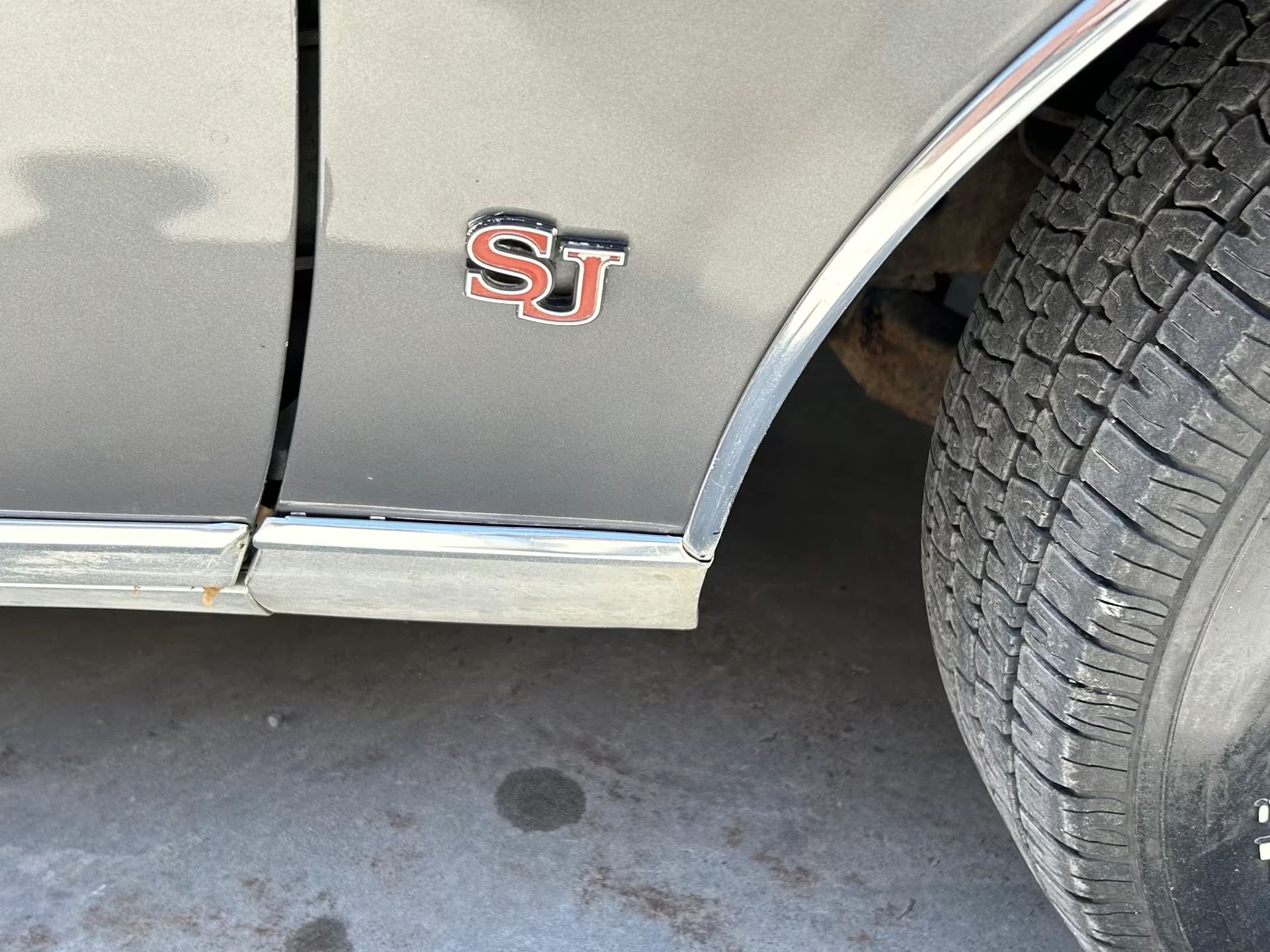 Vintage M/T Road Test: 1979 Pontiac Grand Prix SJ – Rare 4-Speed Manual In A Pontiac PLC Placeholder 4 SJ badge on the right fender of a gray 1979 Pontiac Grand Prix
