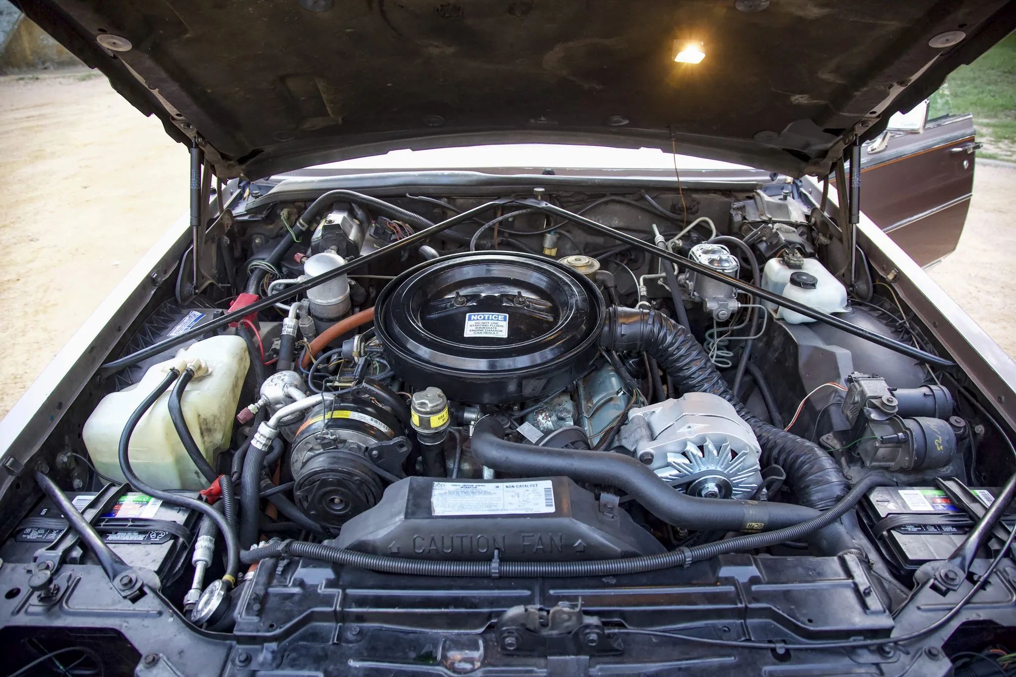 Oldsmobile 5.7-liter diesel V-8 under the hood of a 1982 Cadillac Seville Elegante