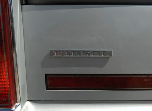 1985 Cadillac De Ville 4.3 V-6 Diesel: The Most Underpowered Cadillac Since Before WW2 21 "Diesel" badge on a silver 1985 Cadillac Sedan de Ville