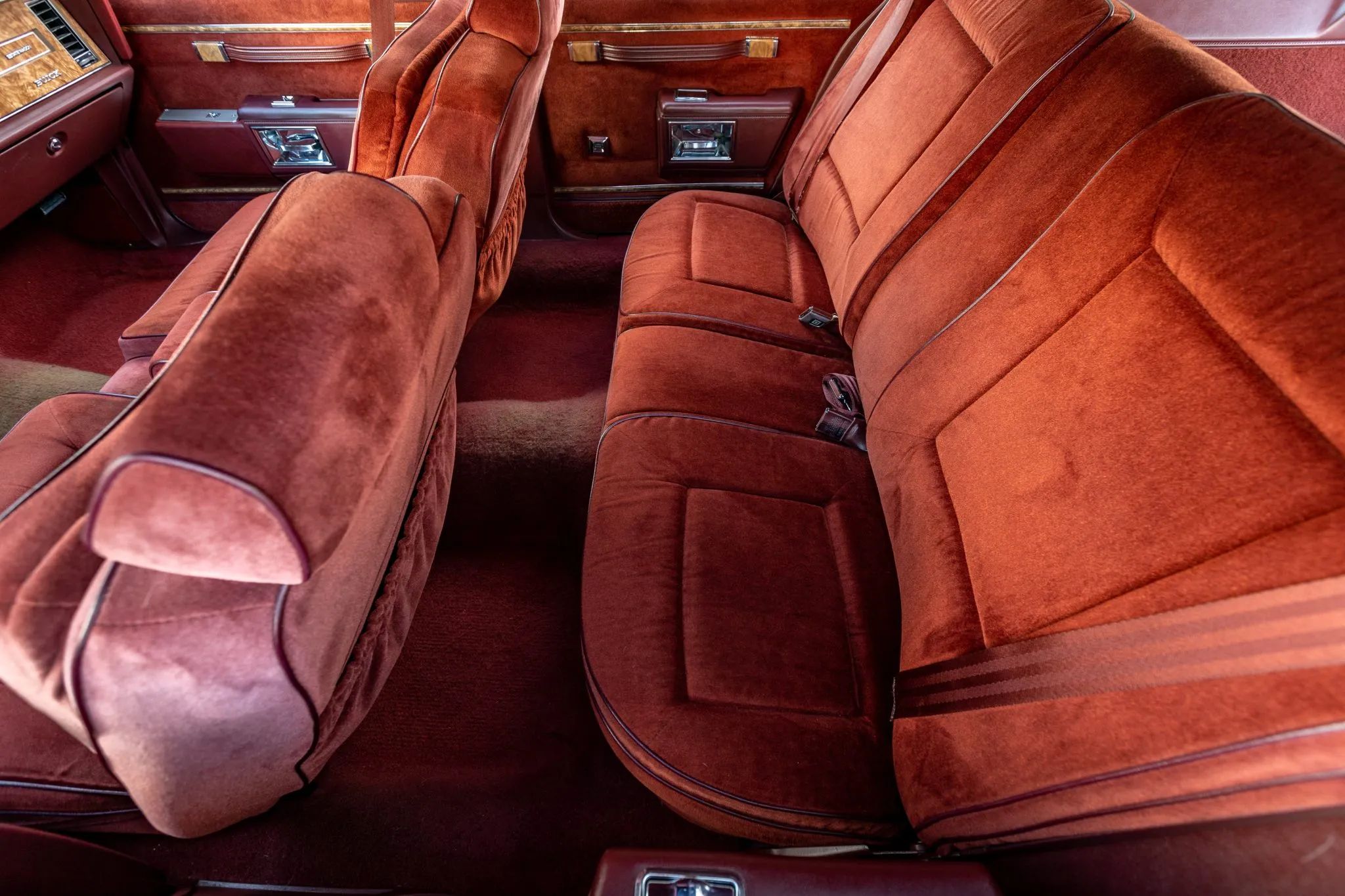 1990 Buick Estate Wagon: Luxurious Family Hauler The Old-Fashioned Way 15 Back seat of a 1990 Buick Estate Wagon with red interior