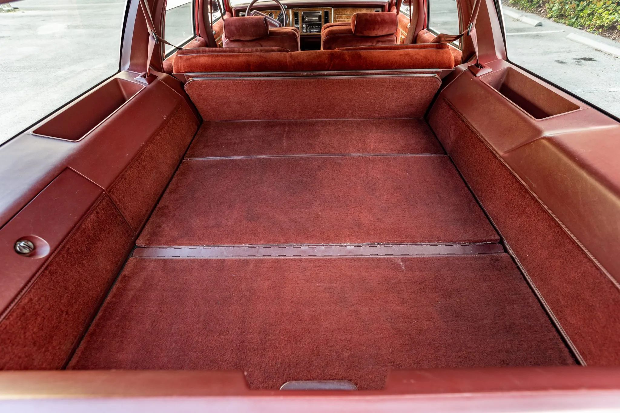 1990 Buick Estate Wagon: Luxurious Family Hauler The Old-Fashioned Way 11 Cargo area of a 1990 Buick Estate Wagon with red interior