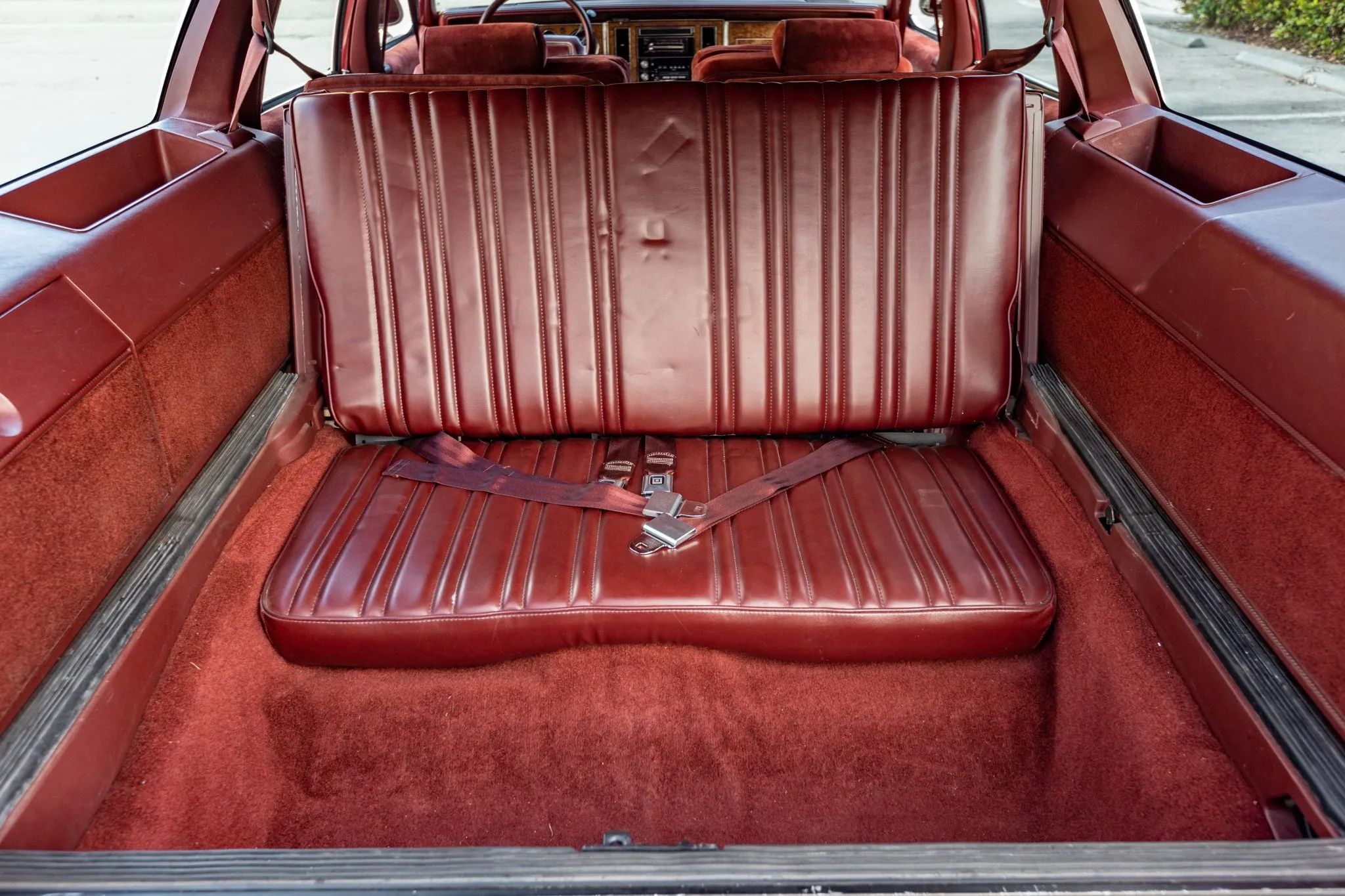 1990 Buick Estate Wagon: Luxurious Family Hauler The Old-Fashioned Way 12 Third seat in a 1990 Buick Estate Wagon with red interior