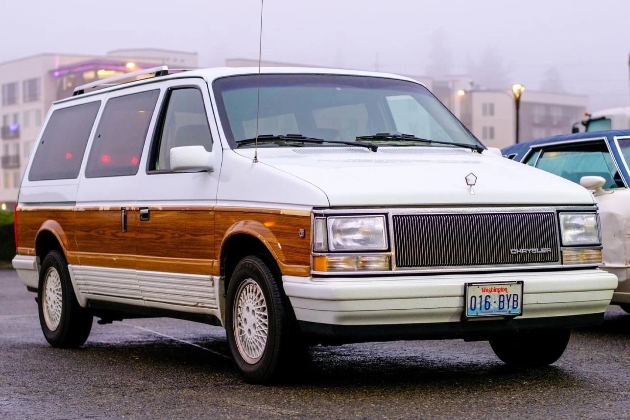 1990 Buick Estate Wagon: Luxurious Family Hauler The Old-Fashioned Way 20 Right front 3q view of a white 1990 Chrysler Town & Country minivan