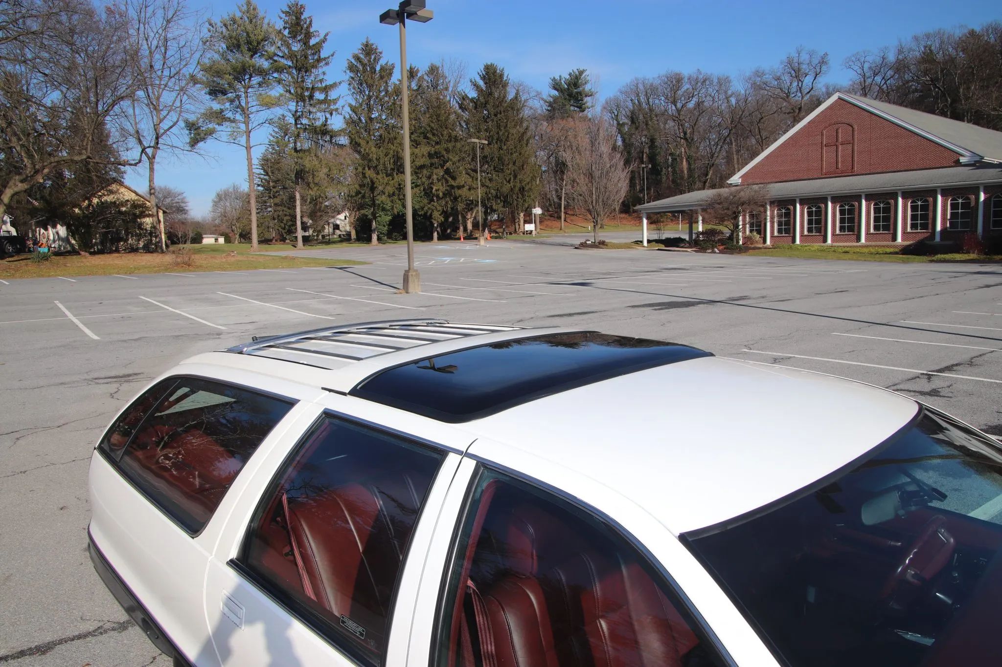1990 Buick Estate Wagon: Luxurious Family Hauler The Old-Fashioned Way 28 Transparent roof panel on a white 1991 Oldsmobile Custom Cruiser station wagon
