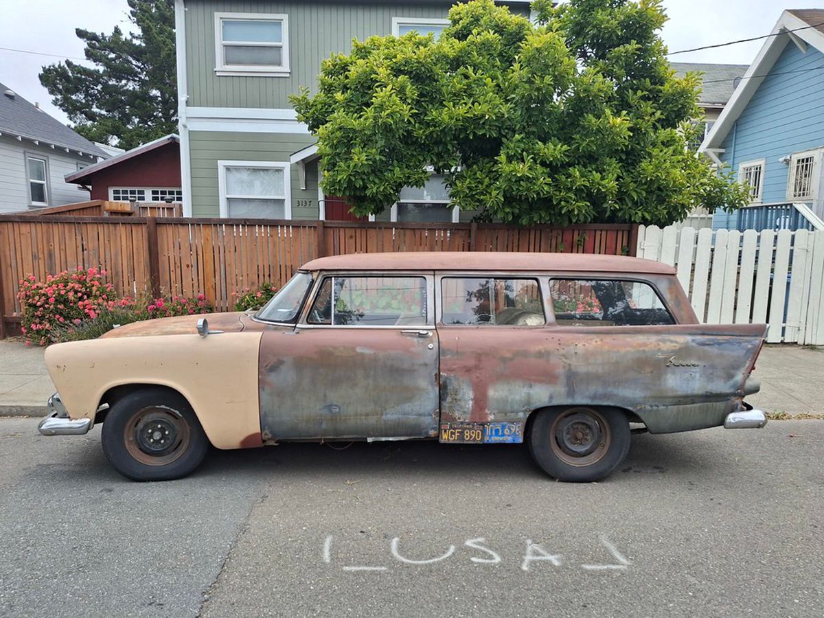 1956 Plymouth Suburban – The Trusty Ol' 2-door Wagon 1 Photo of a battered and discolored 1955 Plymouth Suburban two-door station wagon