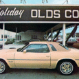Vintage Photos: Oldsmobile Dealerships In The 1970s and 1980s Sanders Oldsmobile, La Brea & Wilshire, Los Angeles, CA.
