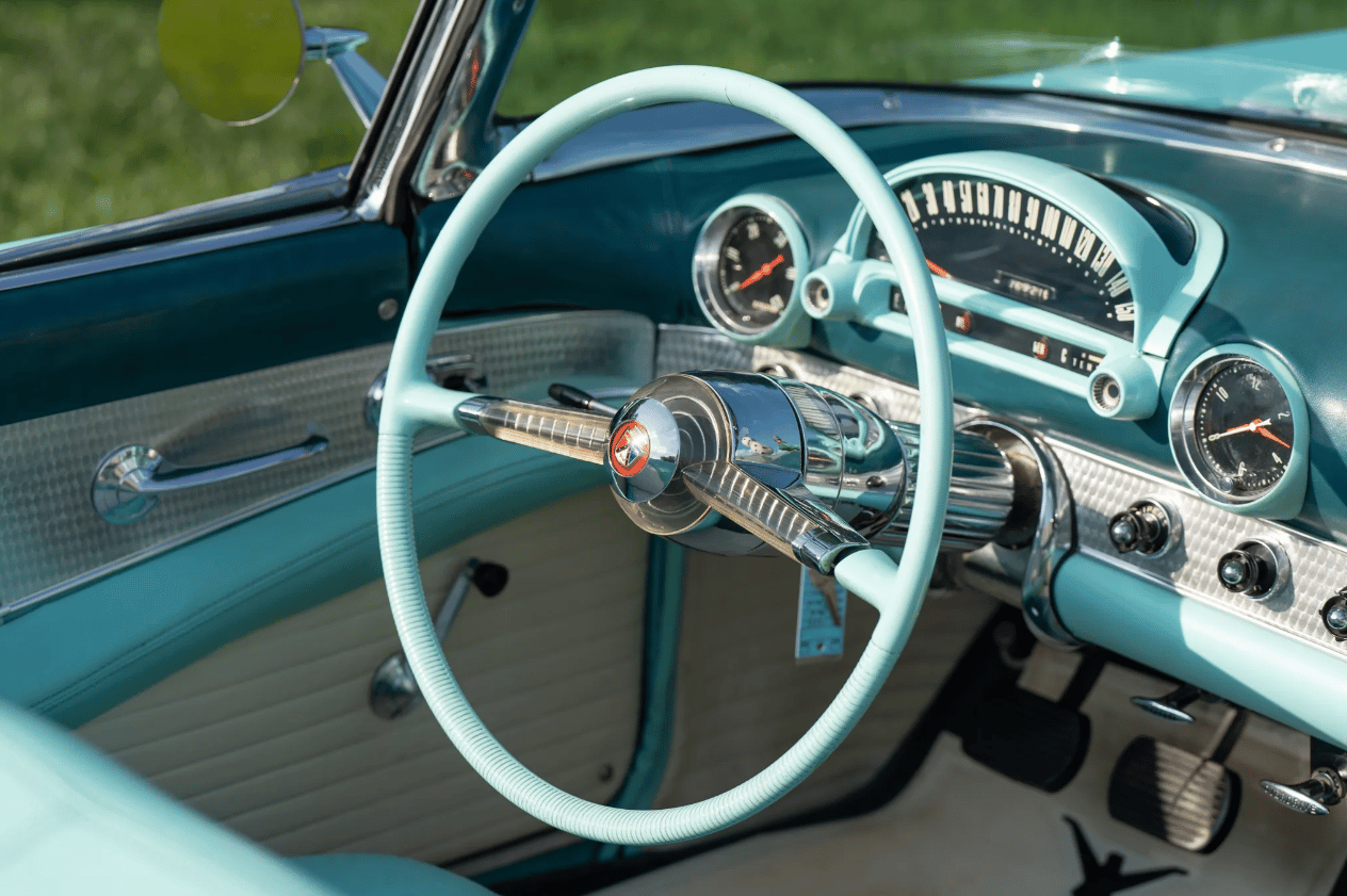 From Chrome To Clear Plastic: Bold Steering Wheels Of The 1950s & 1960s 16 Steering wheel and dashboard of a 1955 Ford Thunderbird with turquoise interior