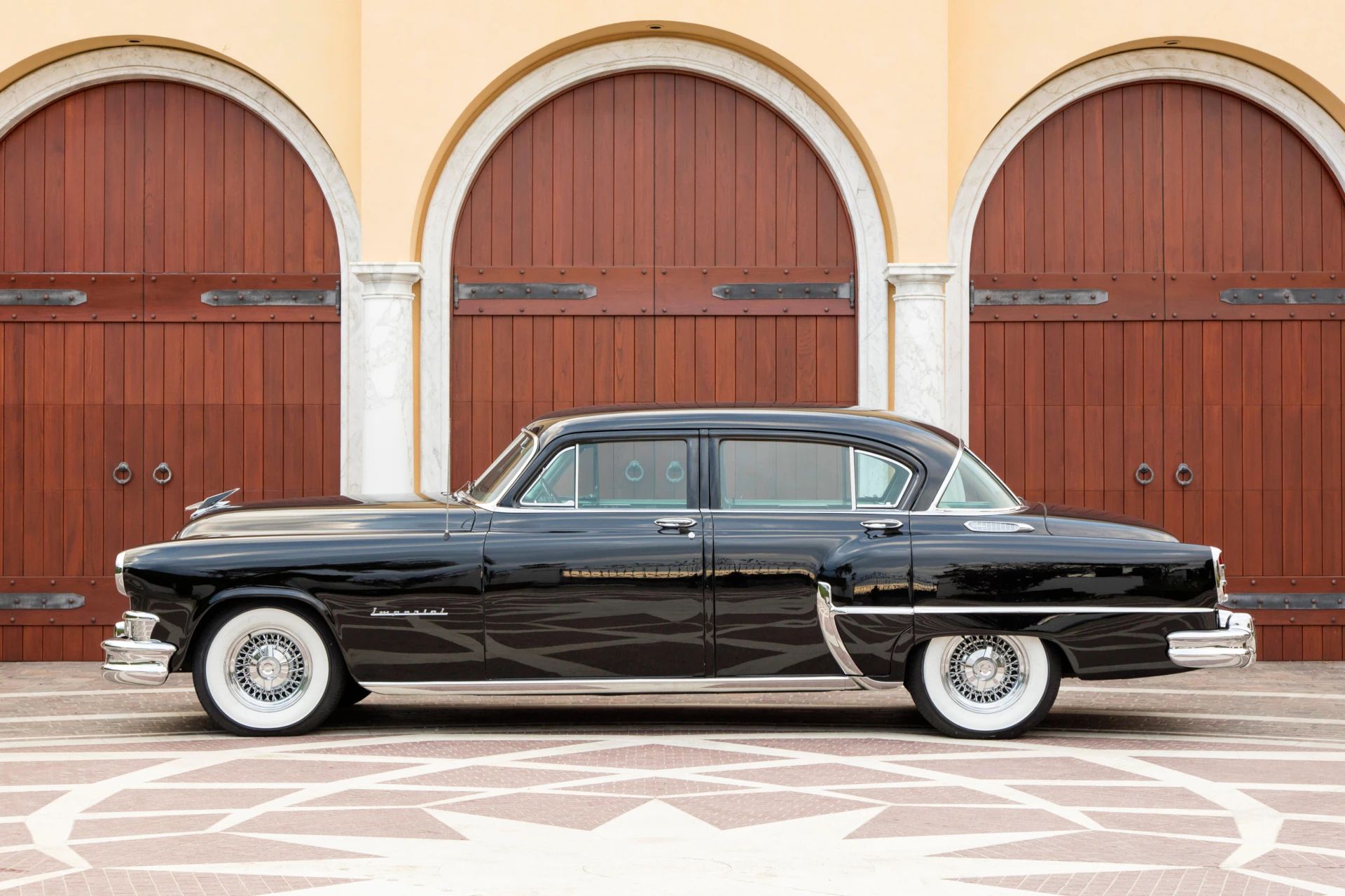 Left side view of a black 1953 Chrysler C-58 Custom Imperial sedan