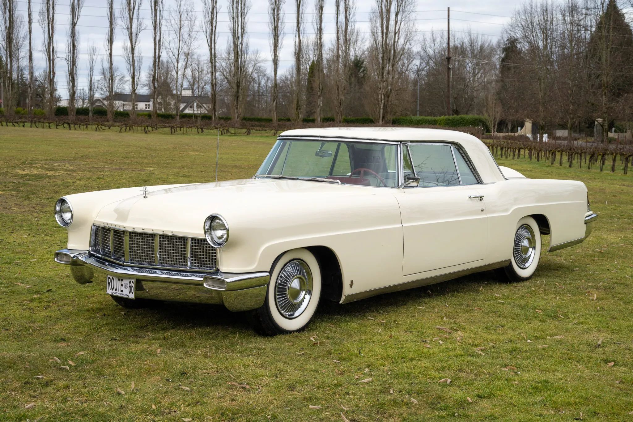 No, The Lincoln Continental Did Not Invent The Continental Kit: Griff Borgeson Makes The Case 9 Front 3q view of a white 1956 Continental Mark II hardtop parked on grass