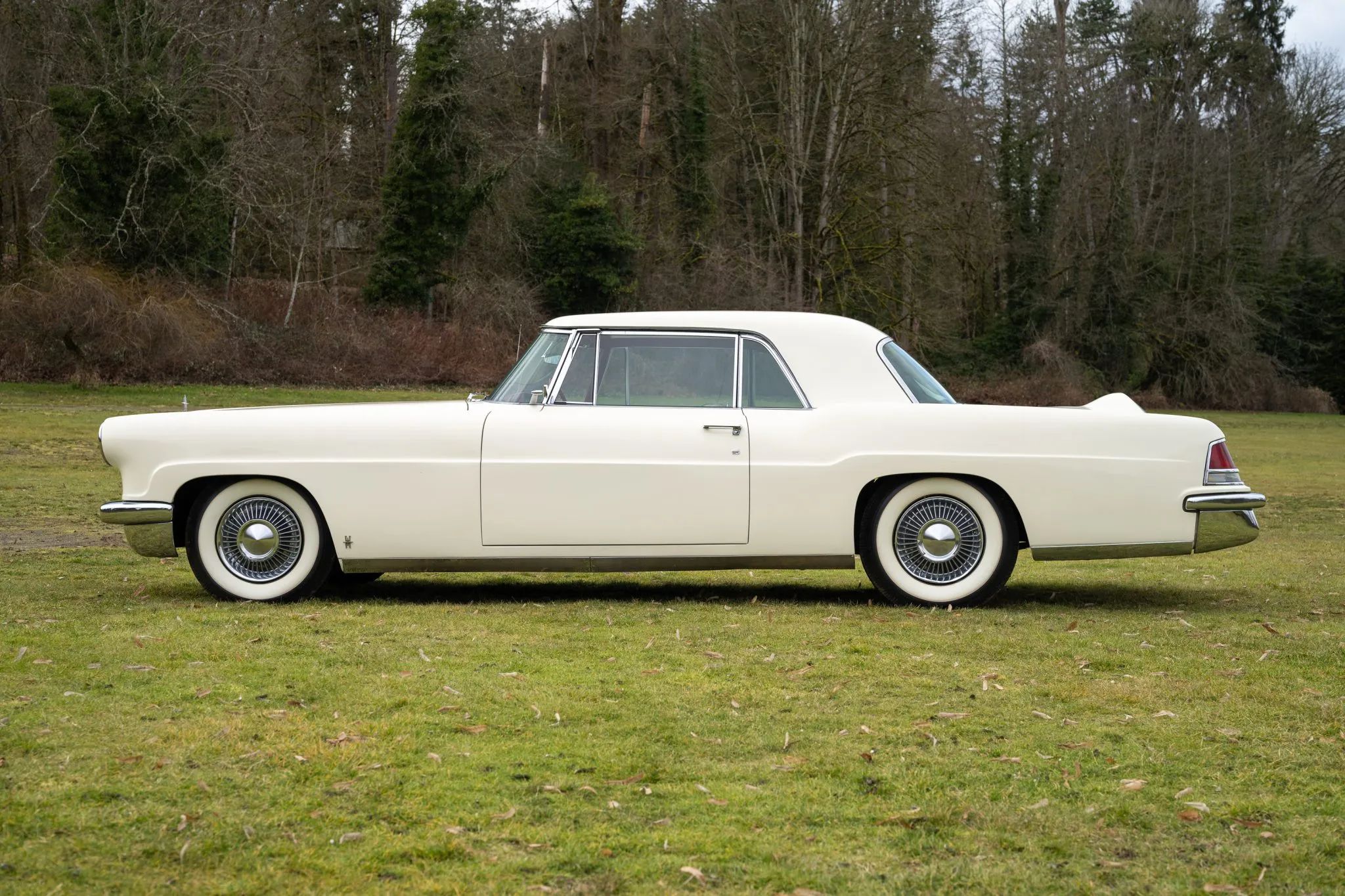No, The Lincoln Continental Did Not Invent The Continental Kit: Griff Borgeson Makes The Case 3 Left side view of a white 1956 Continental Mark II hardtop