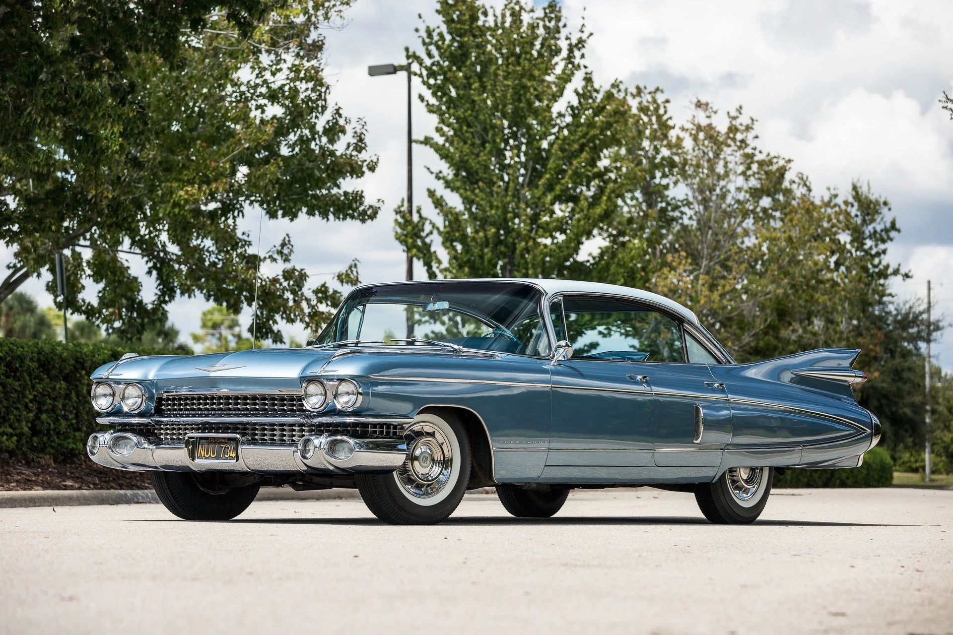 1960 Cadillac Fleetwood Sixty Special: Enviably Green, But No A/C 14 Left front 3q view of a blue 1959 Cadillac Fleetwood Sixty Special, with a large simulated intake on the rear door and fender
