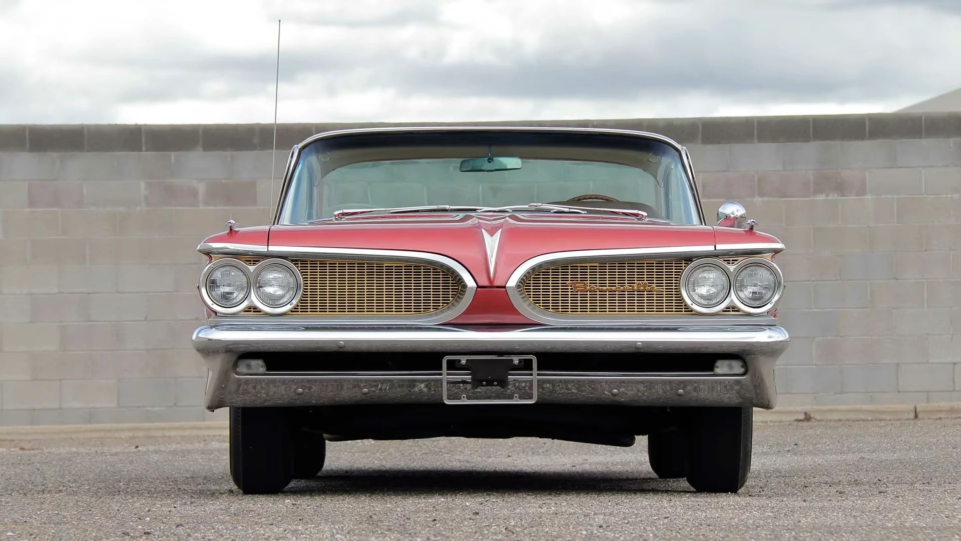 Front view of a red 1959 Pontiac Bonneville two-door hardtop