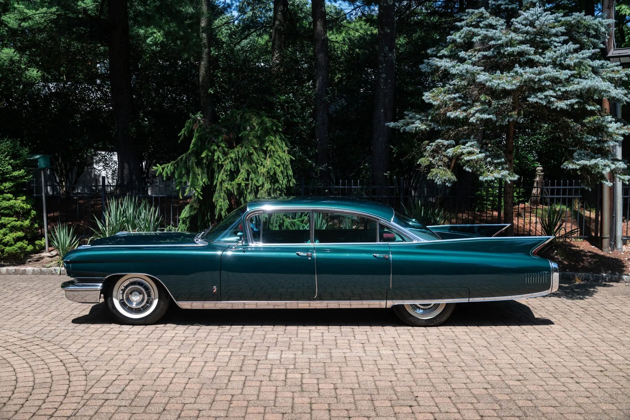 1960 Cadillac Fleetwood Sixty Special: Enviably Green, But No A/C 3 Left side view of a green 1960 Cadillac Fleetwood Sixty Special four-door hardtop