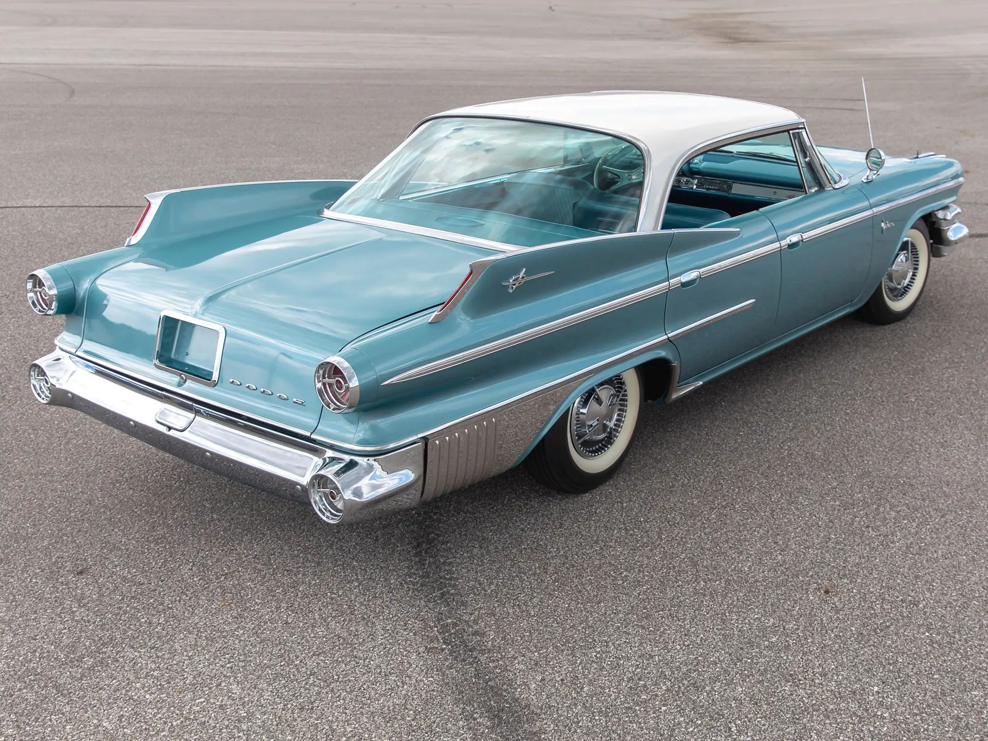 How Aerodynamic Were Old Cars? Here's Actual Wind Tunnel Data On Some 1960 Models. 24 High-angle right rear 3q view of a teal 1960 Dodge Polara four-door hardtop with a white roof
